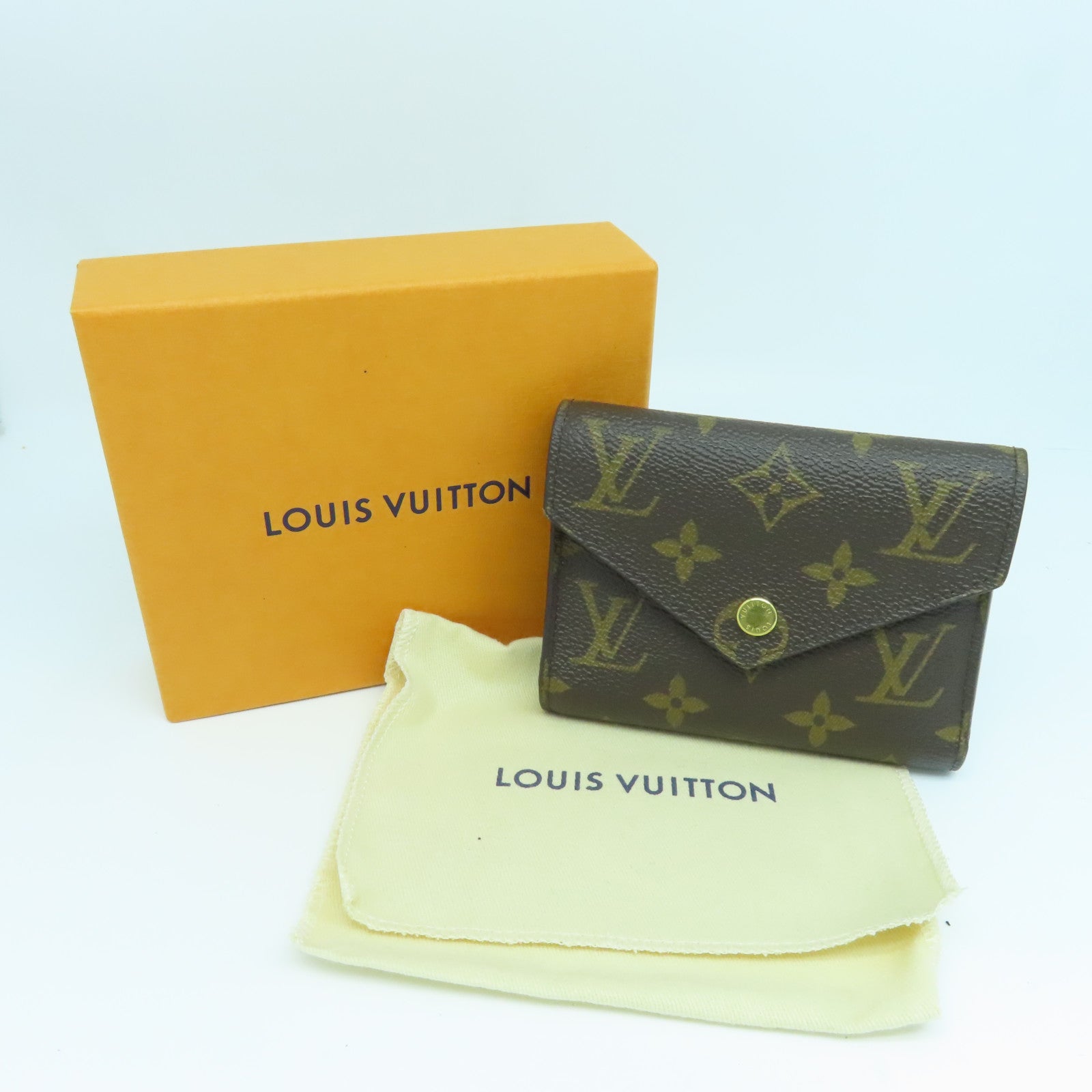 LOUIS VUITTON Monogram Wallet gold buckle wallet brown