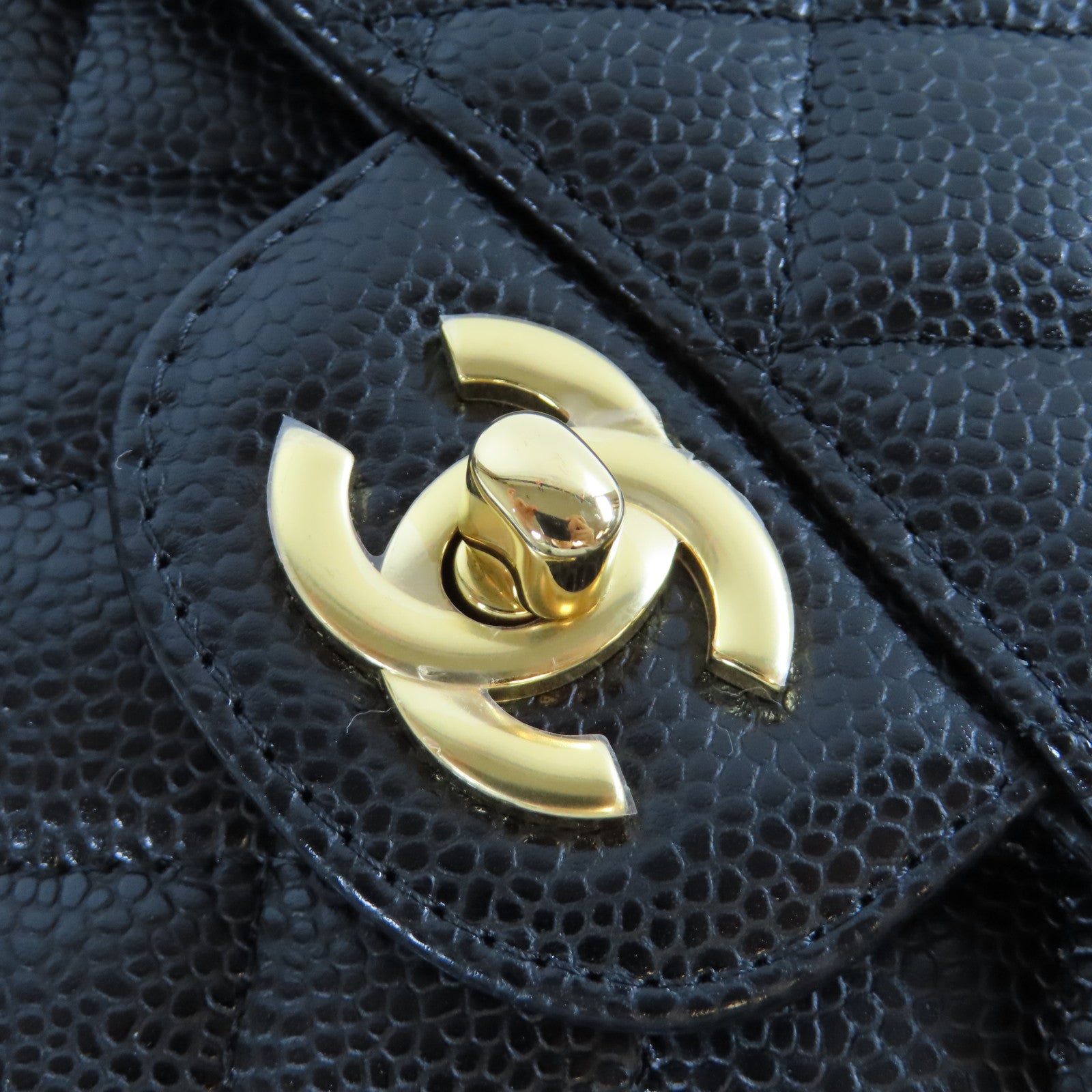 CHANEL 菱格Caviar皮革Classic 23cm金扣鏈帶肩背袋黑色