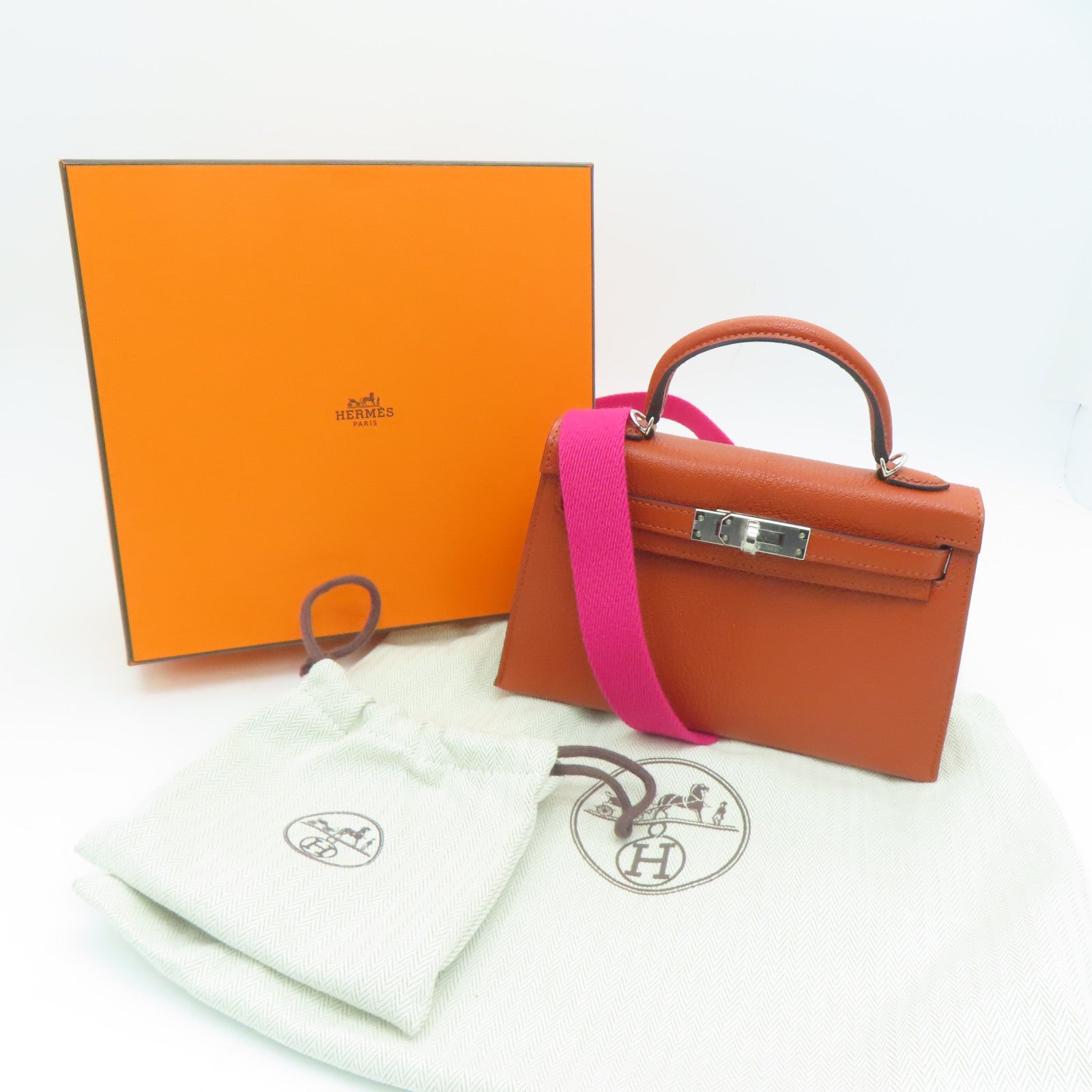 HERMES Chevre皮革Mini Kelly II銀扣肩背袋Potiron橙色