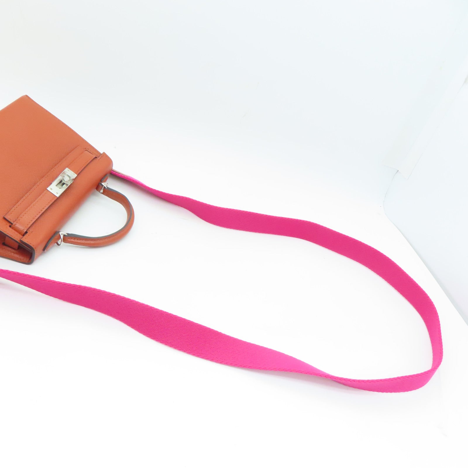 HERMES Chevre皮革Mini Kelly II銀扣肩背袋Potiron橙色