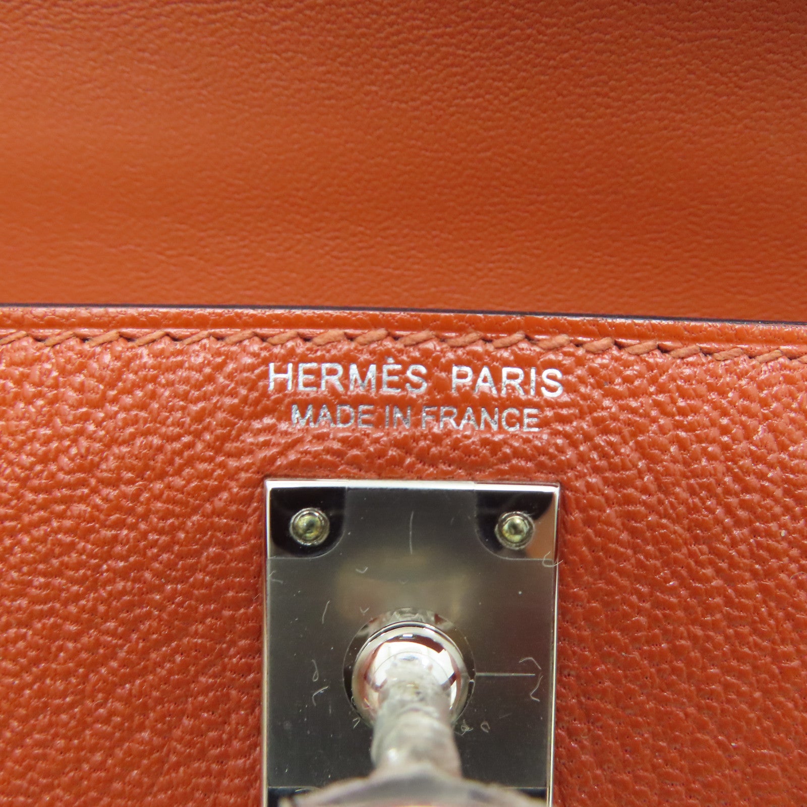 HERMES Chevre皮革Mini Kelly II銀扣肩背袋Potiron橙色