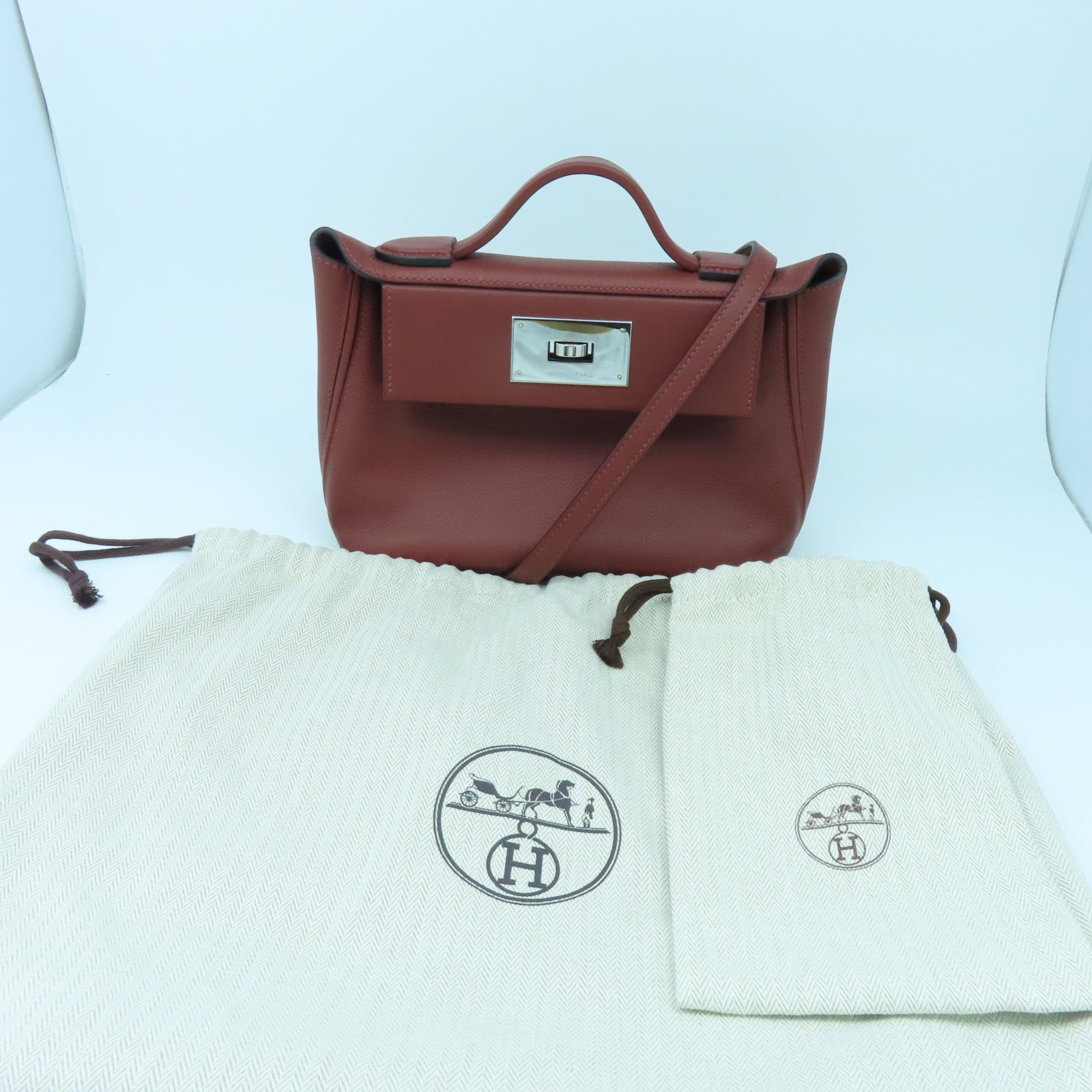 HERMES Evercolor皮革Mini 24/24銀扣肩背袋RougeH酒紅色