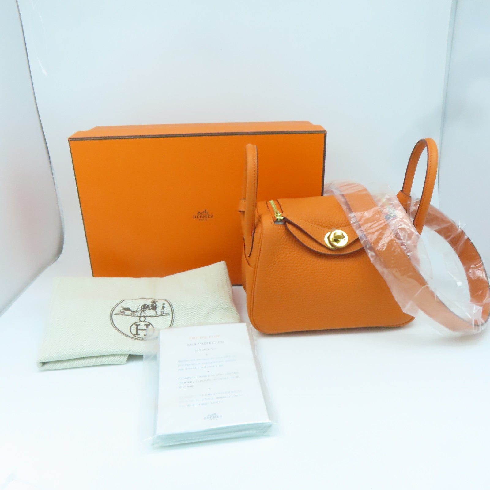 HERMES Clemence皮革Mini Lindy金扣手挽肩背兩用袋經典橘