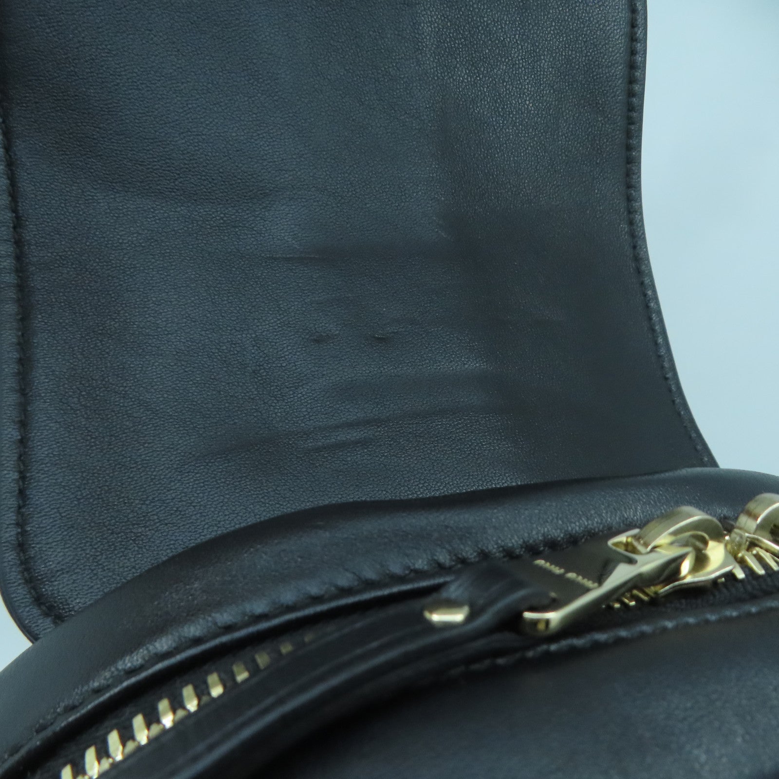 Miu Miu 羊皮皮革Miu Miu Backpack金扣背包黑色