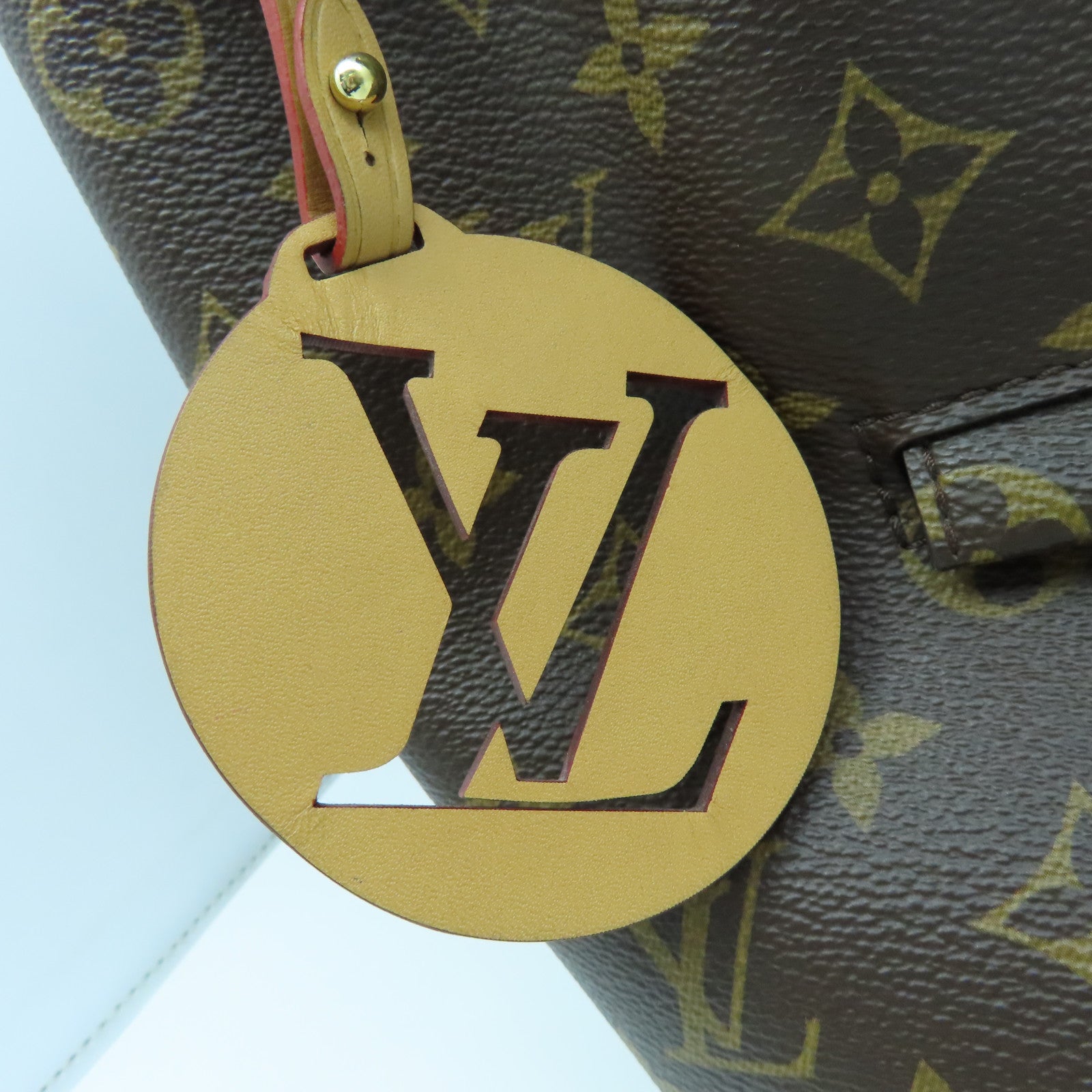 LOUIS VUITTON Monogram Montsuris PM Gold Buckle Backpack Brown