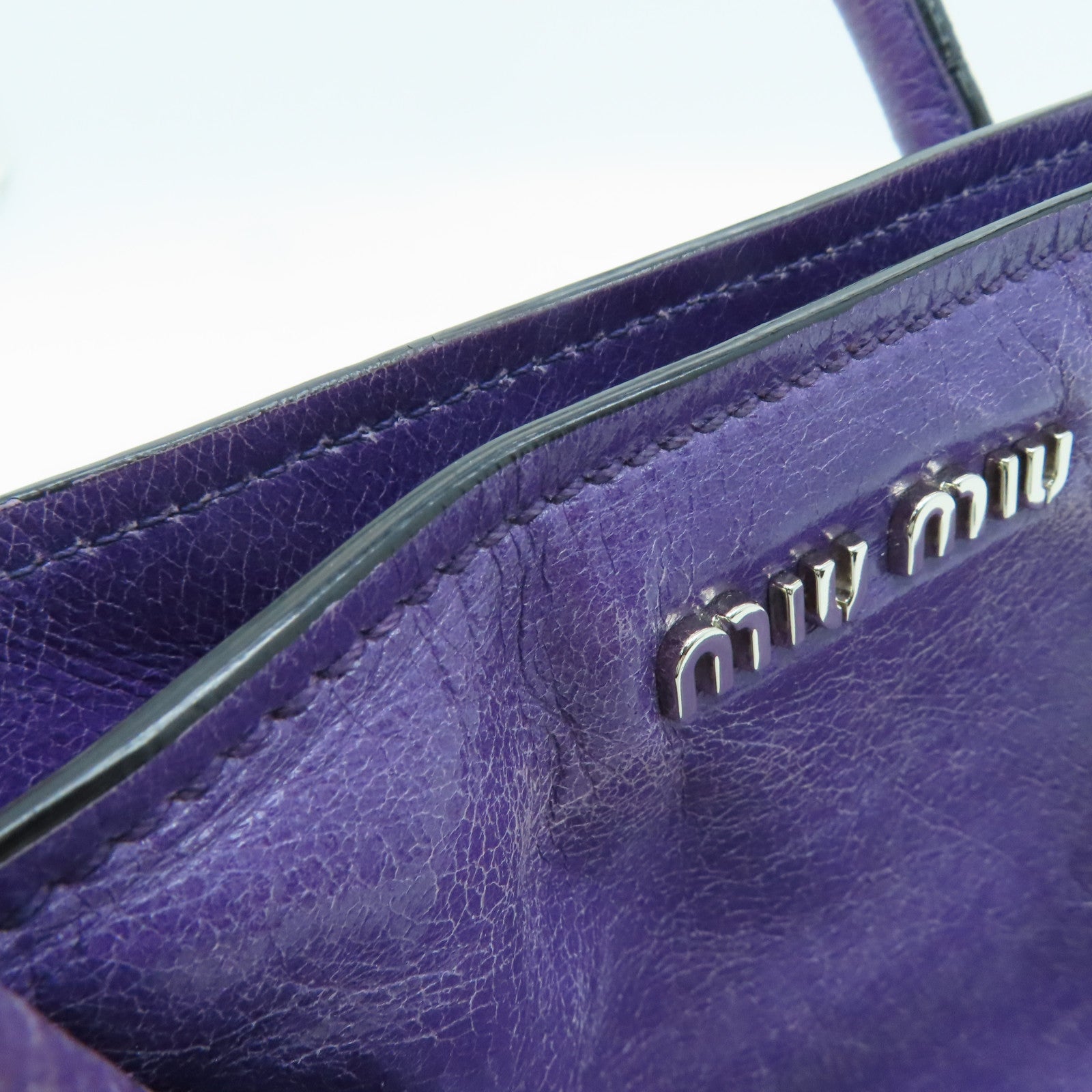 Miu Miu 【激減優惠】牛皮皮革Handbag銀扣手挽袋紫色