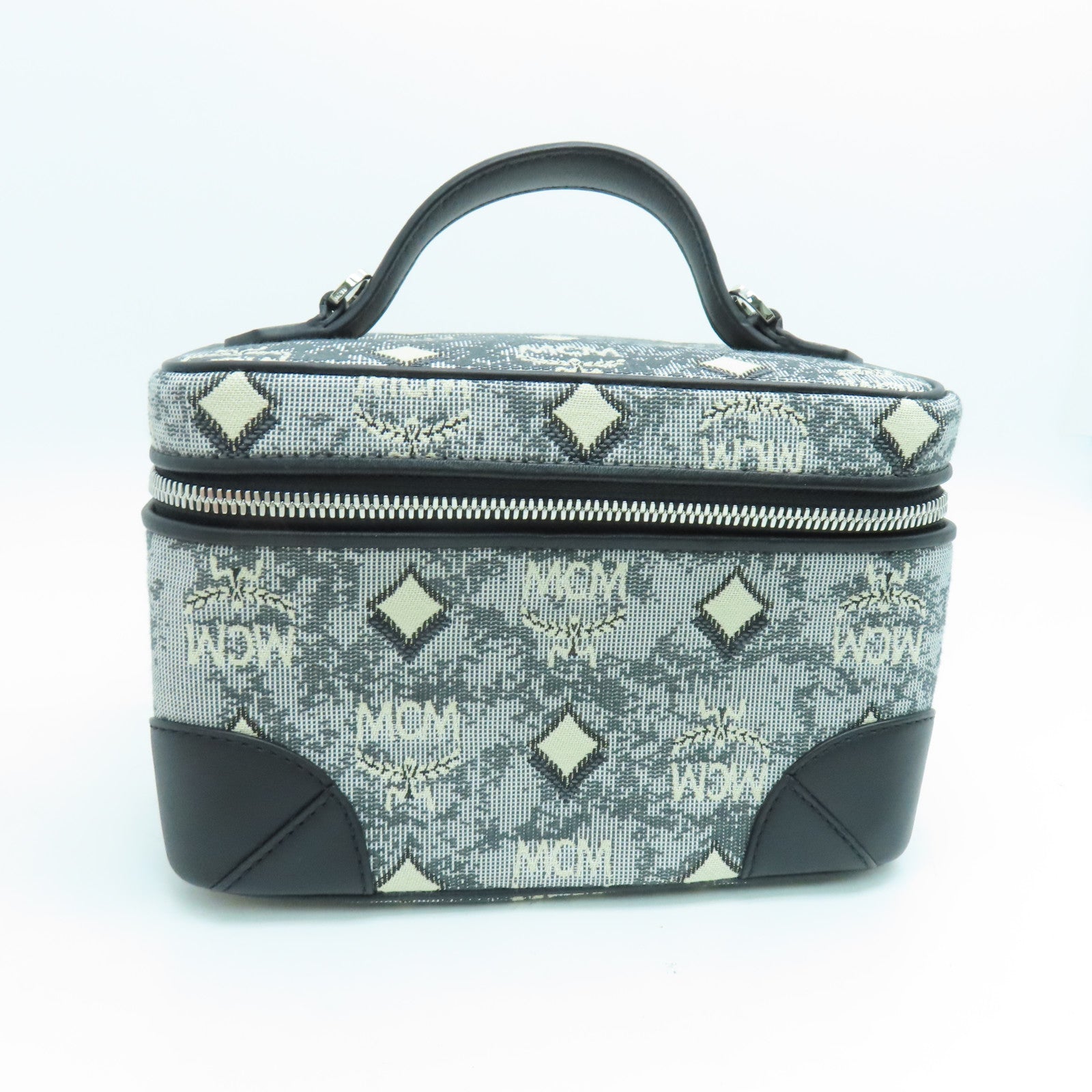 MCM 帆布Vanity Case銀扣手挽袋黑色/白色