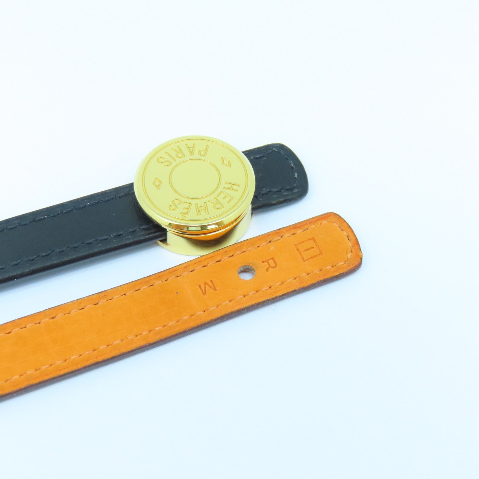 HERMES 牛皮皮革Looping Bracelet金扣手鐲黑色/橙色