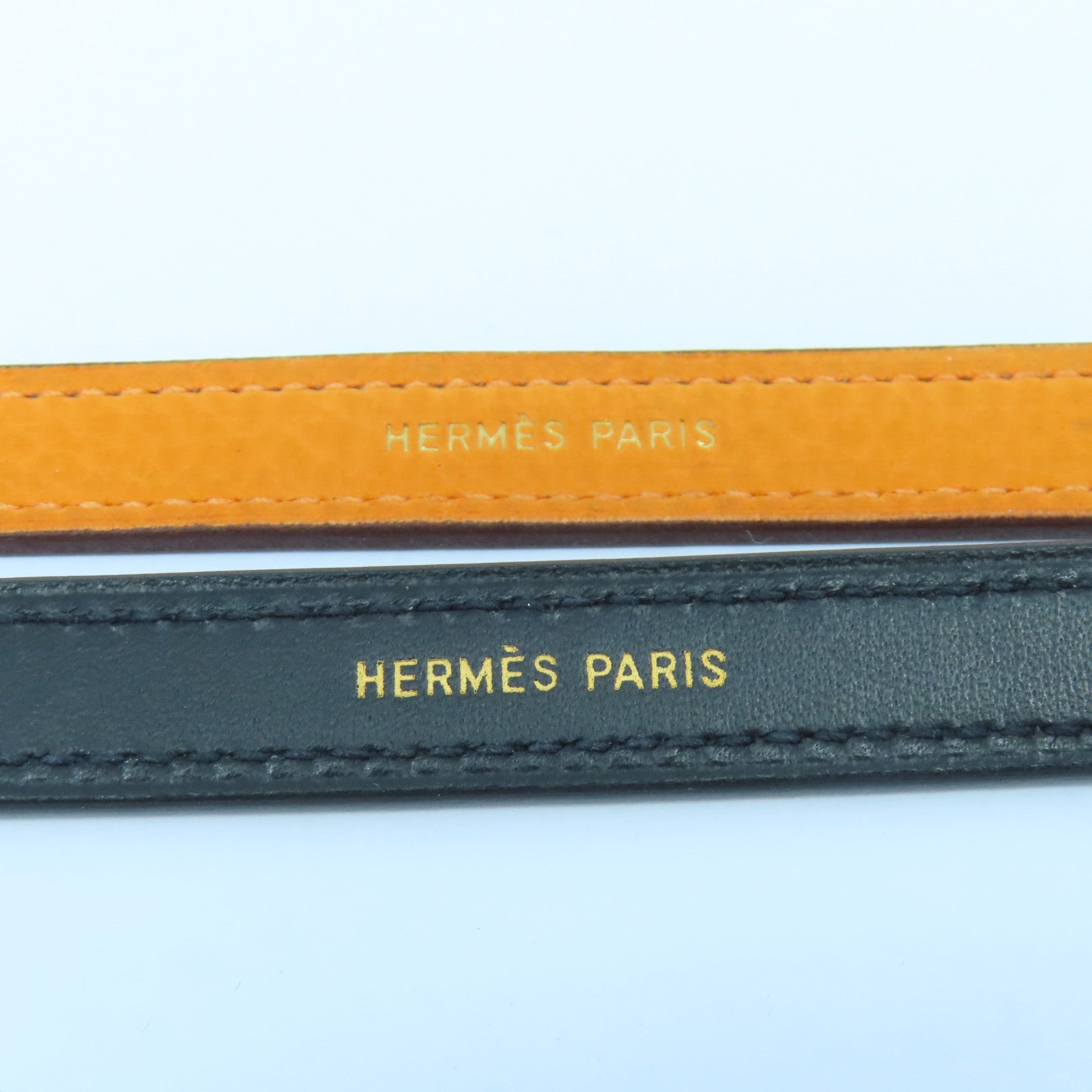 HERMES 牛皮皮革Looping Bracelet金扣手鐲黑色/橙色