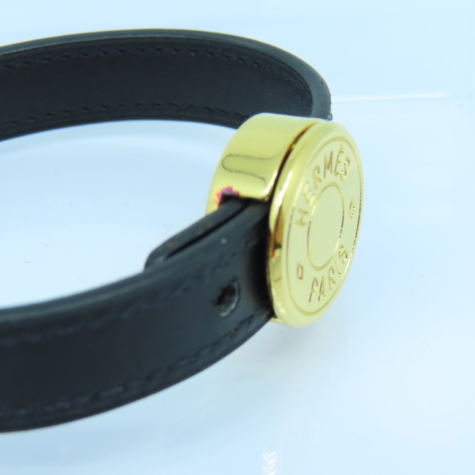 HERMES 牛皮皮革Looping Bracelet金扣手鐲黑色/橙色