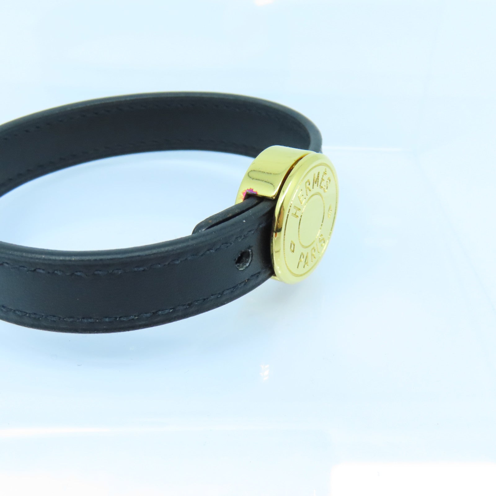 HERMES 牛皮皮革Looping Bracelet金扣手鐲黑色/橙色