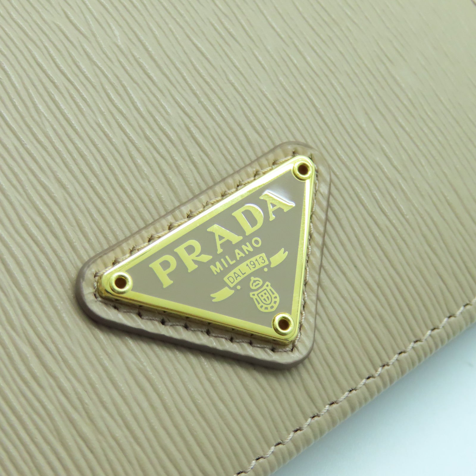 PRADA 牛皮皮革Key case 6金扣钱包米色