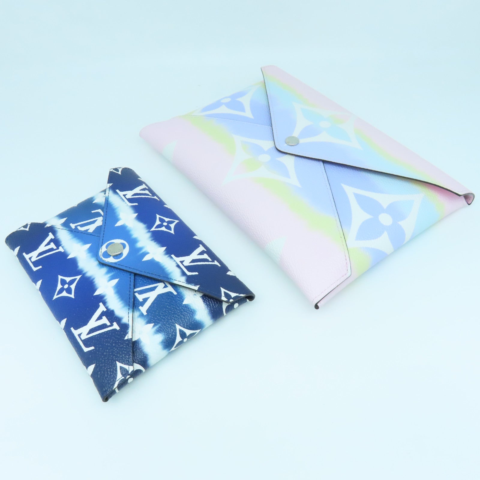 LOUIS VUITTON Monogram Kirigami Pochette Silver Buckle Clutch Color/Blue