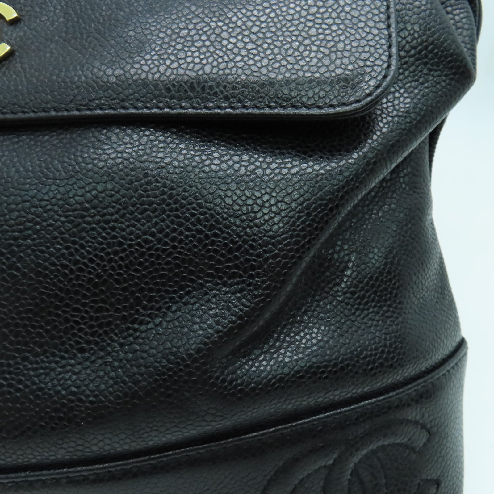 CHANEL Caviar皮革Rucksack金扣背包黑色