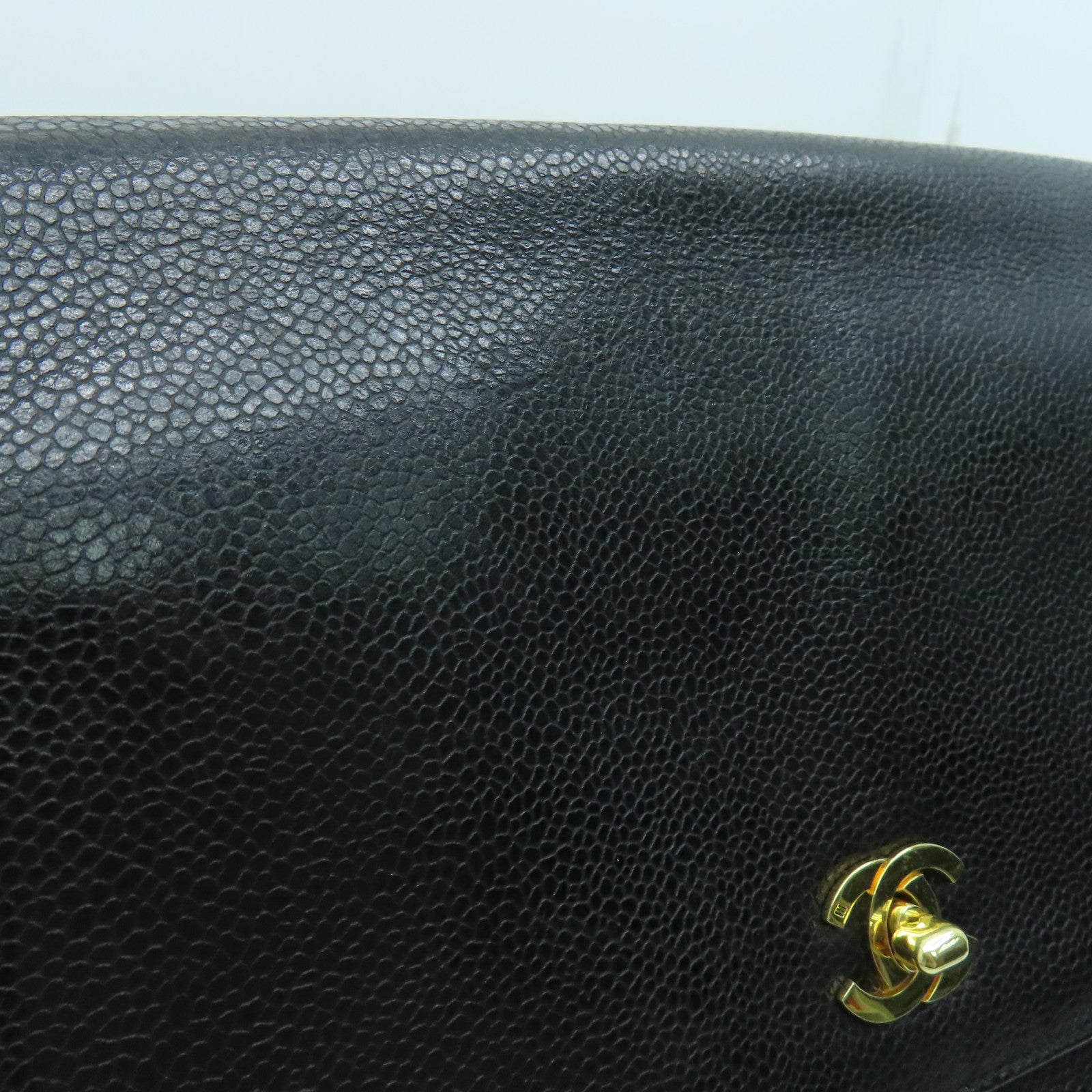 CHANEL Caviar皮革Rucksack金扣背包黑色