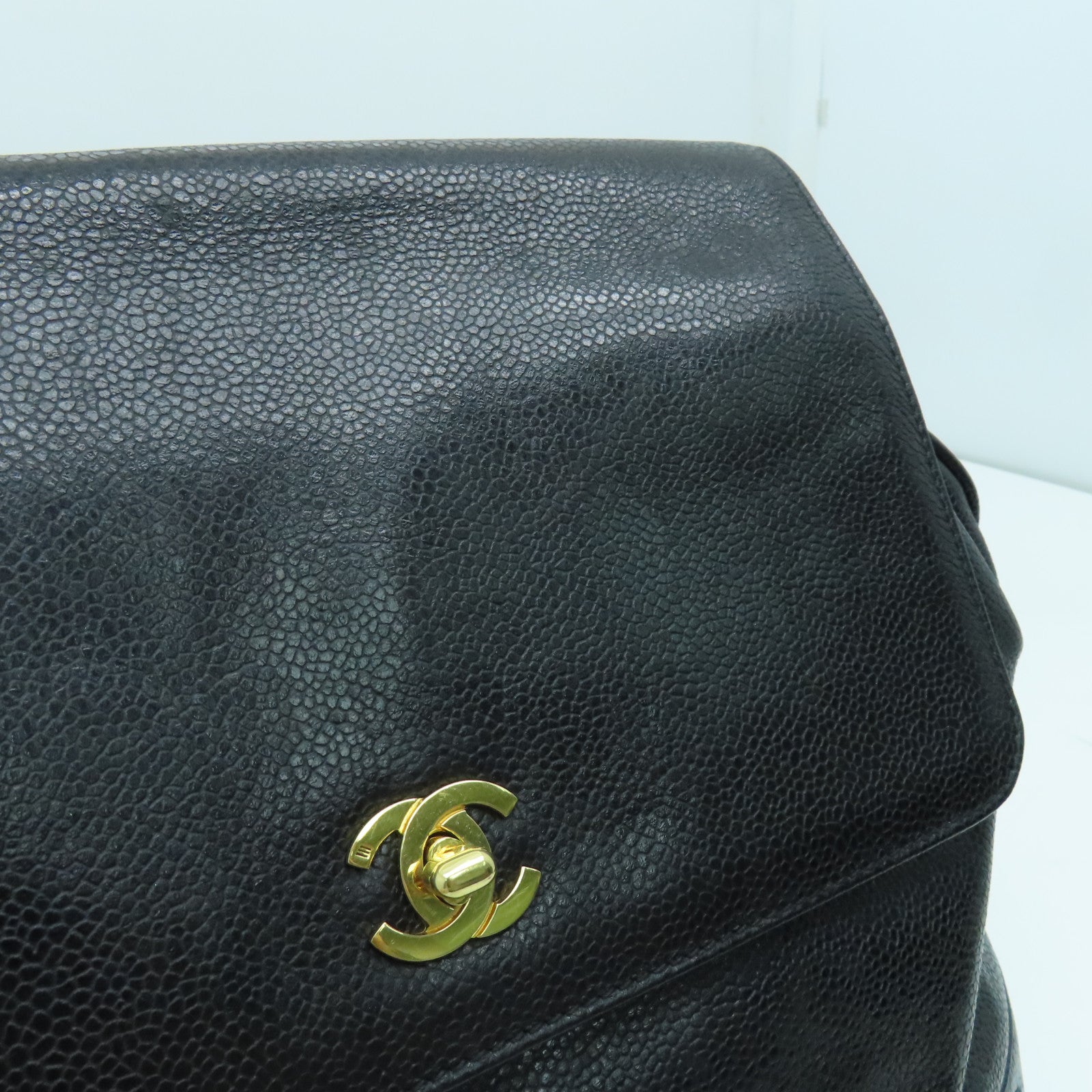CHANEL Caviar皮革Rucksack金扣背包黑色