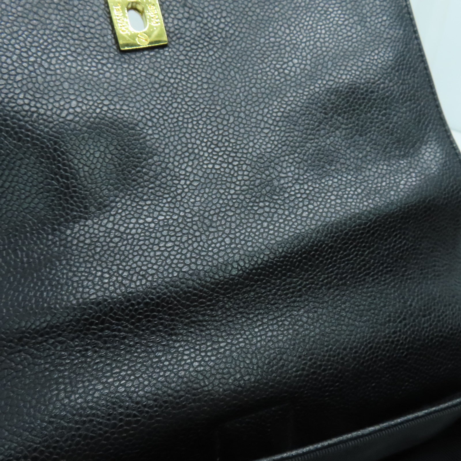 CHANEL Caviar皮革Rucksack金扣背包黑色