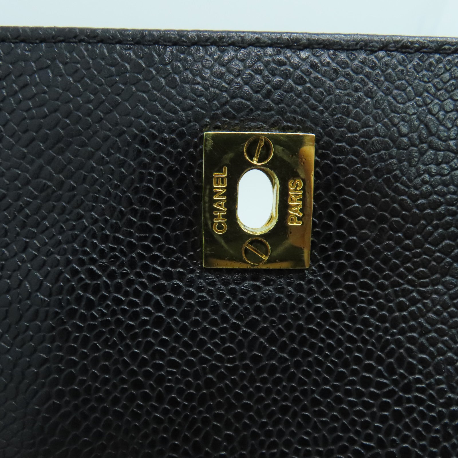 CHANEL Caviar皮革Rucksack金扣背包黑色