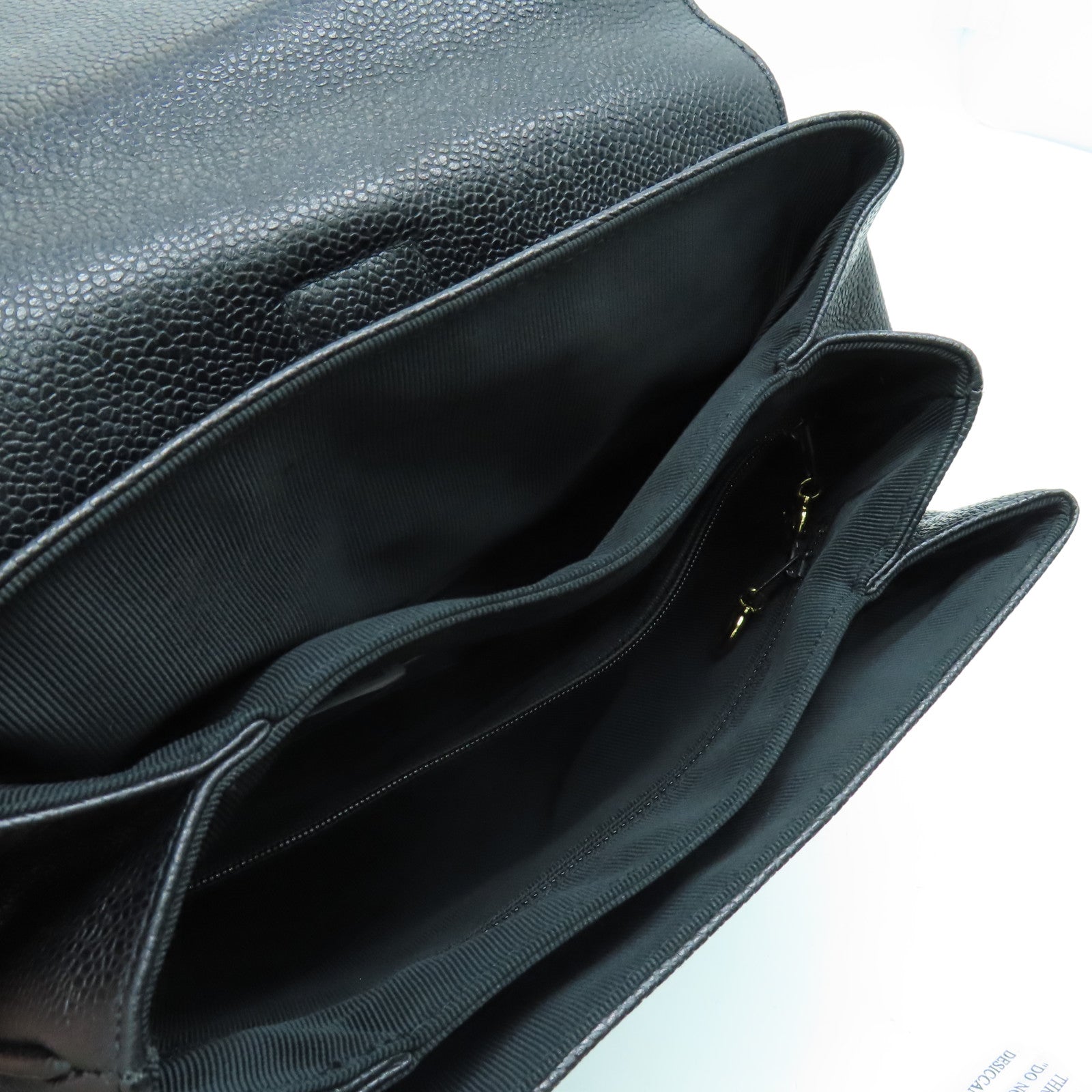 CHANEL Caviar皮革Rucksack金扣背包黑色