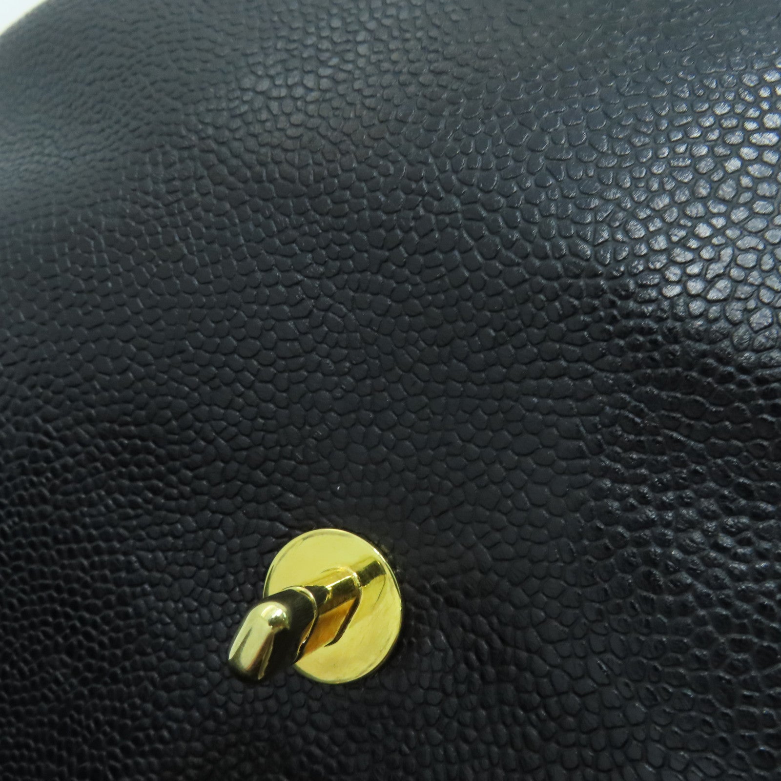 CHANEL Caviar皮革Rucksack金扣背包黑色