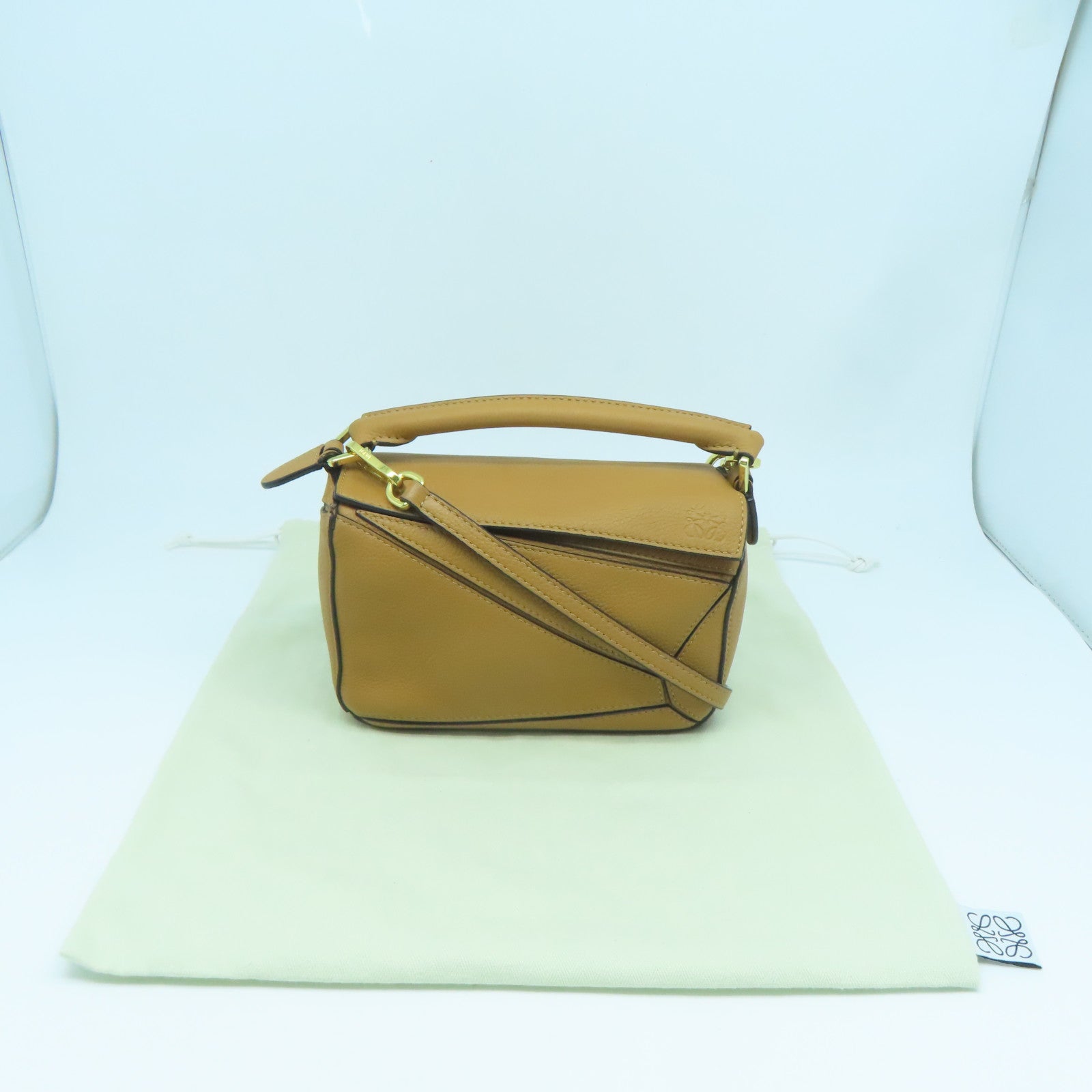 LOEWE 牛皮皮革Mini Puzzle金扣手挽肩背兩用袋啡色