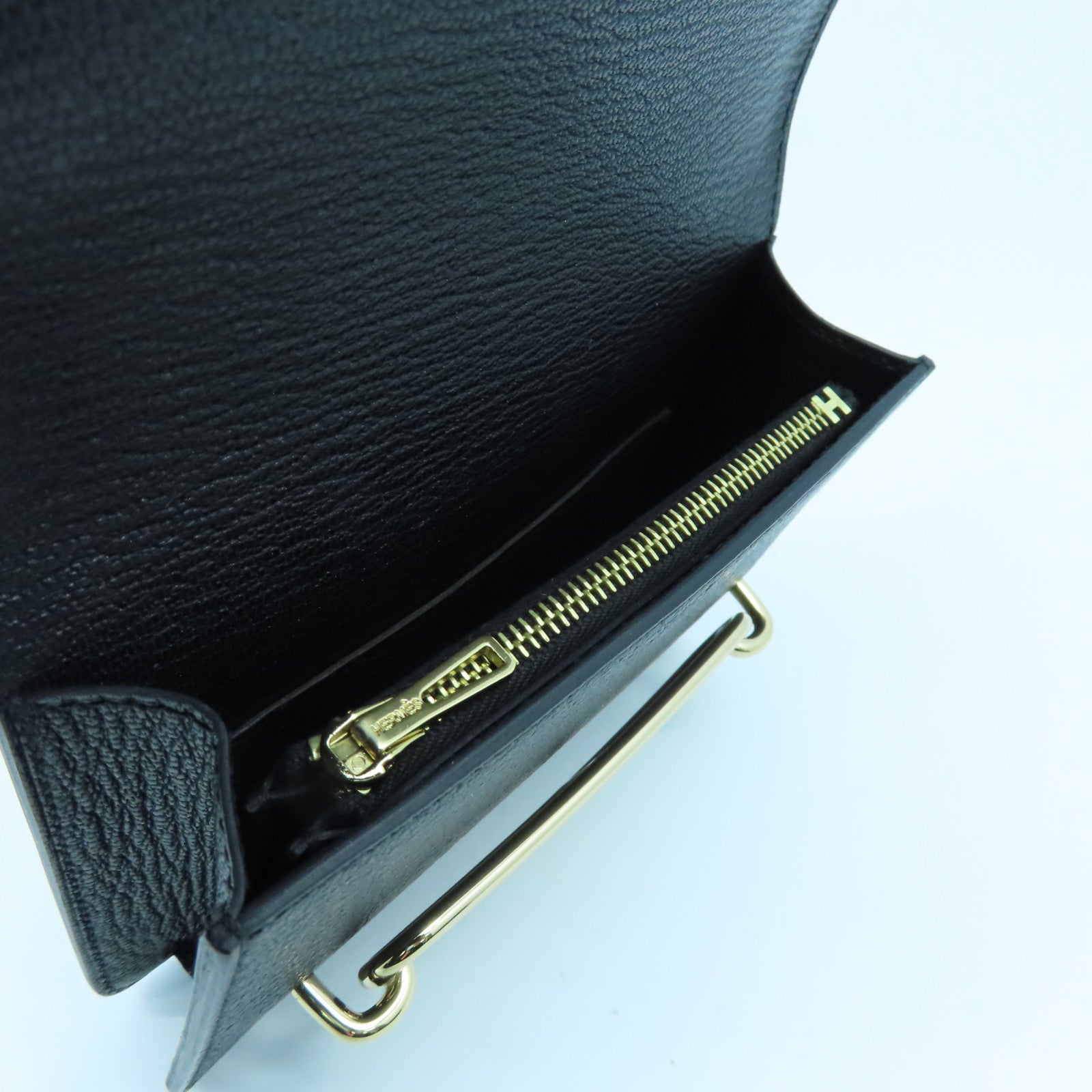 HERMES Chevre皮革Pouch金扣手拿包黑色
