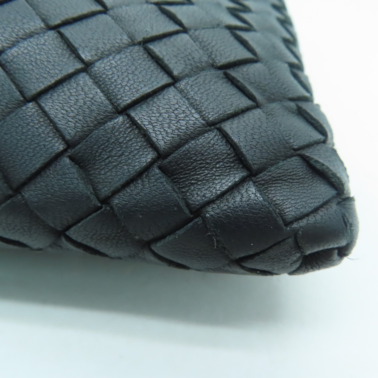 BOTTEGA VENETA 織紋皮革Pouch銀扣手拿包黑色
