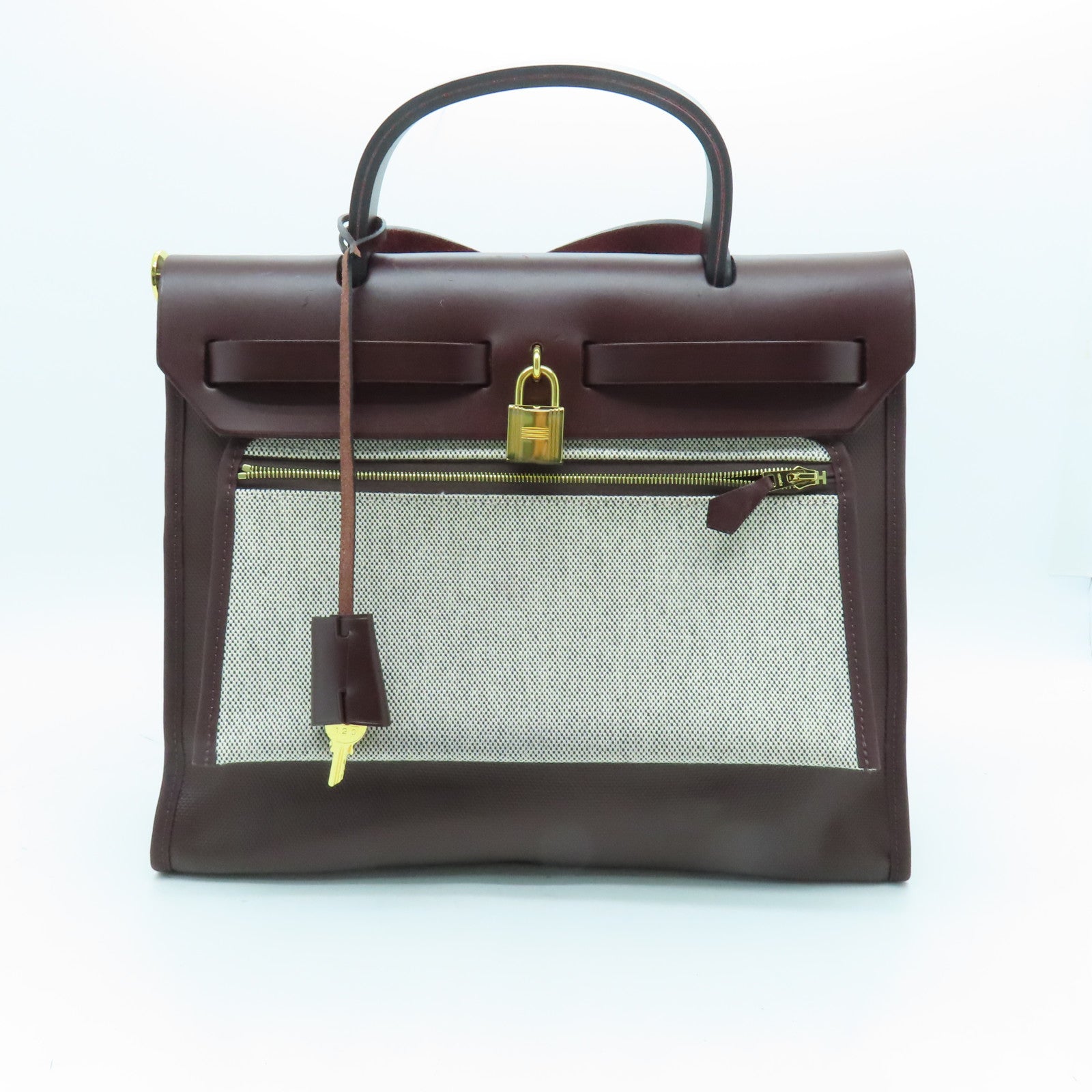HERMES Canvas Herbag PM Gold Buckle Hand Shoulder Dual-purpose Bag Wine Red