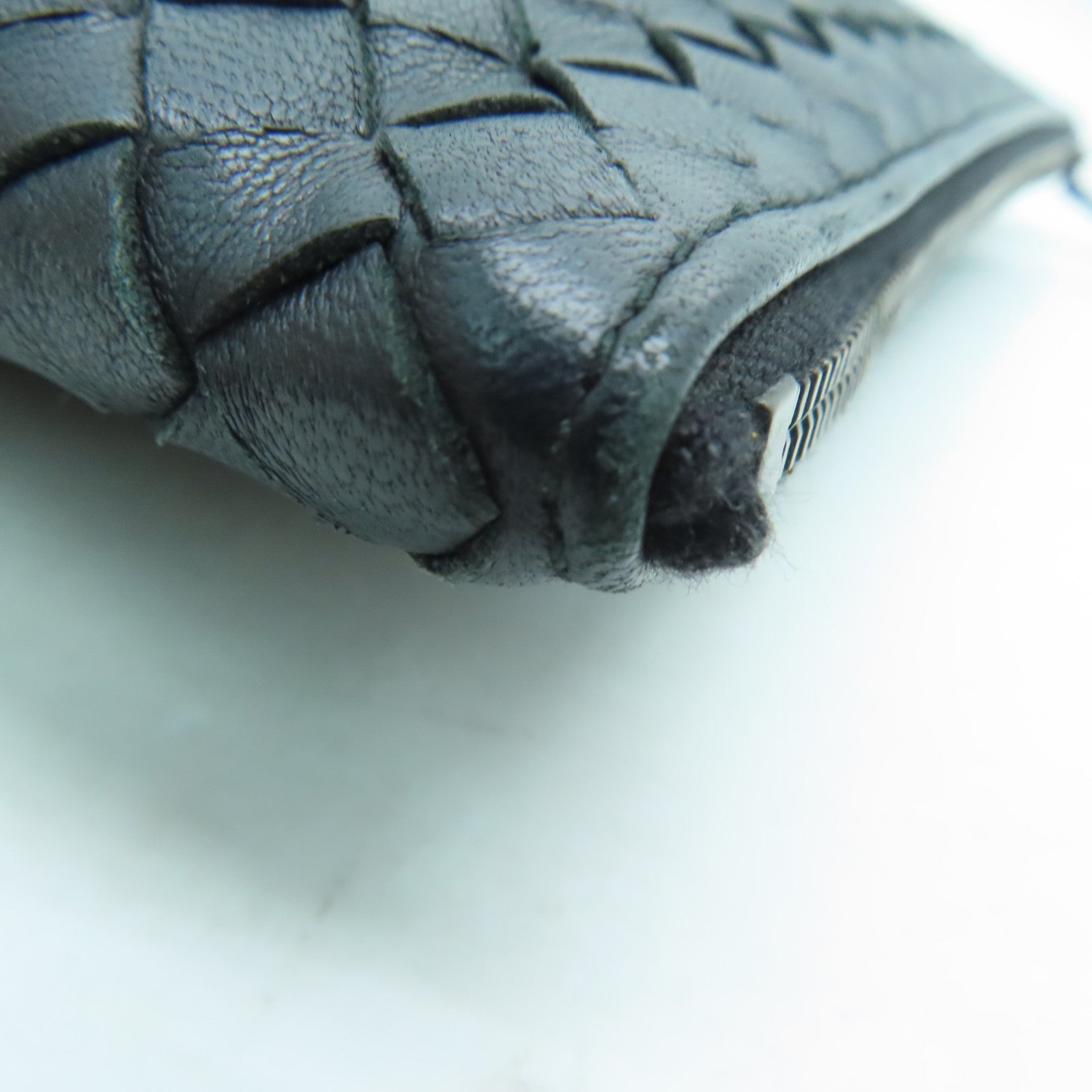 BOTTEGA VENETA 織紋皮革Pouch銀扣手拿包黑色