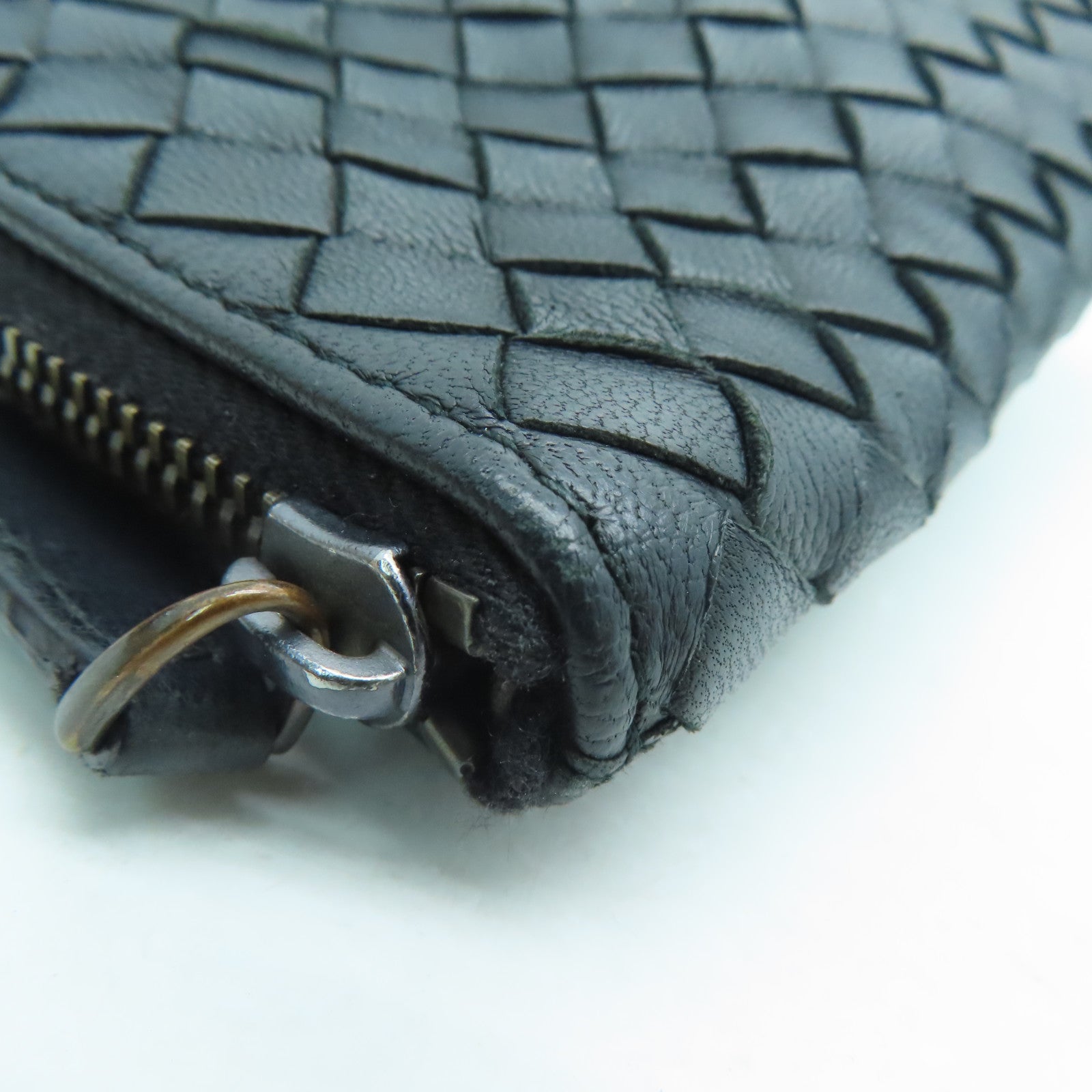 BOTTEGA VENETA 織紋皮革Pouch銀扣手拿包黑色