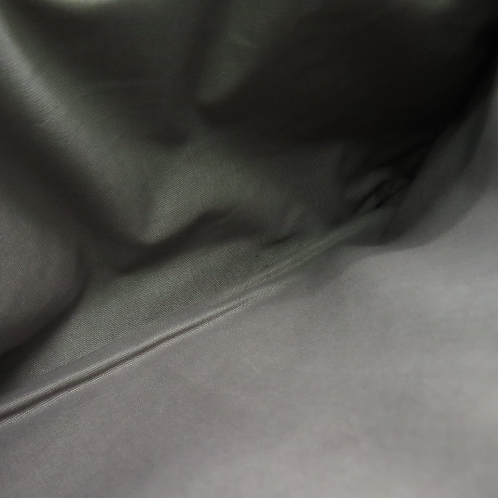 BOTTEGA VENETA 織紋皮革Pouch銀扣手拿包黑色