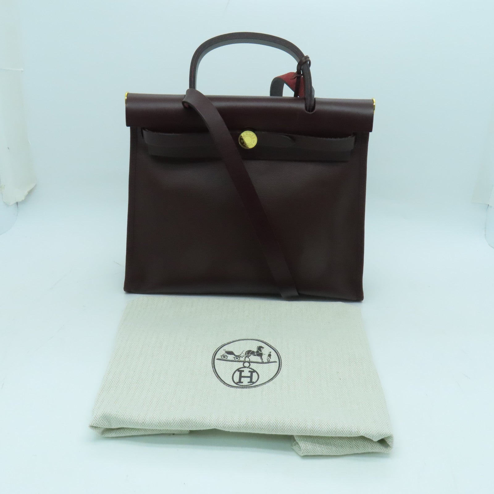 HERMES Canvas Herbag PM Gold Buckle Hand Shoulder Dual-purpose Bag Wine Red