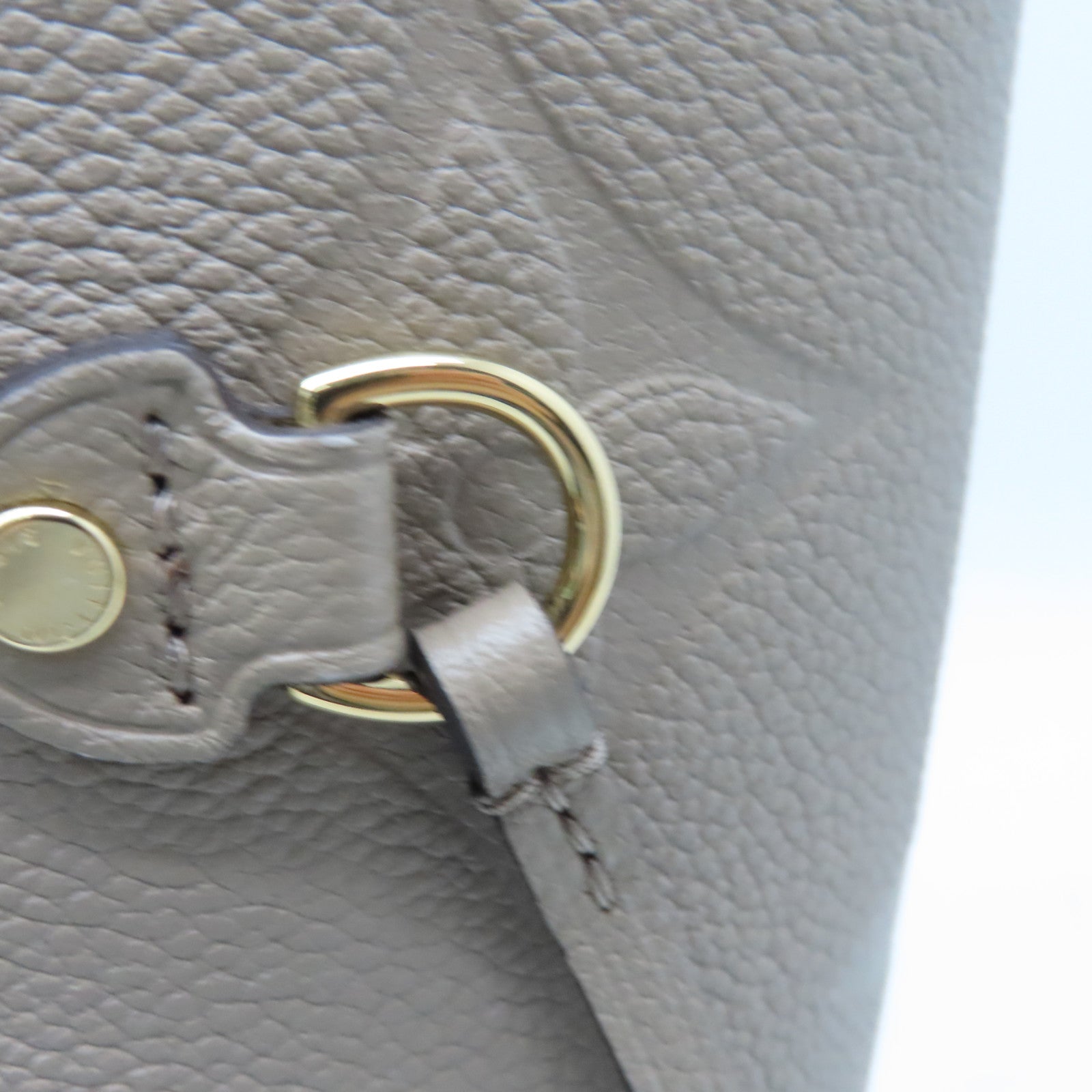 LOUIS VUITTON Monogram Empreinte Neverfull MM gold buckle handle bag light brown