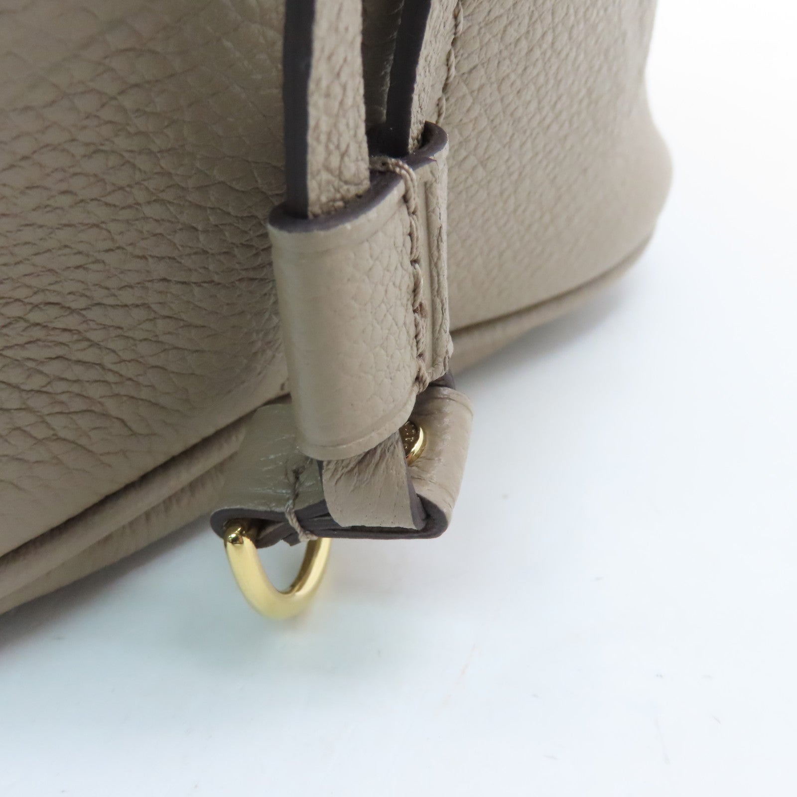 LOUIS VUITTON Monogram Empreinte Neverfull MM gold buckle handle bag light brown