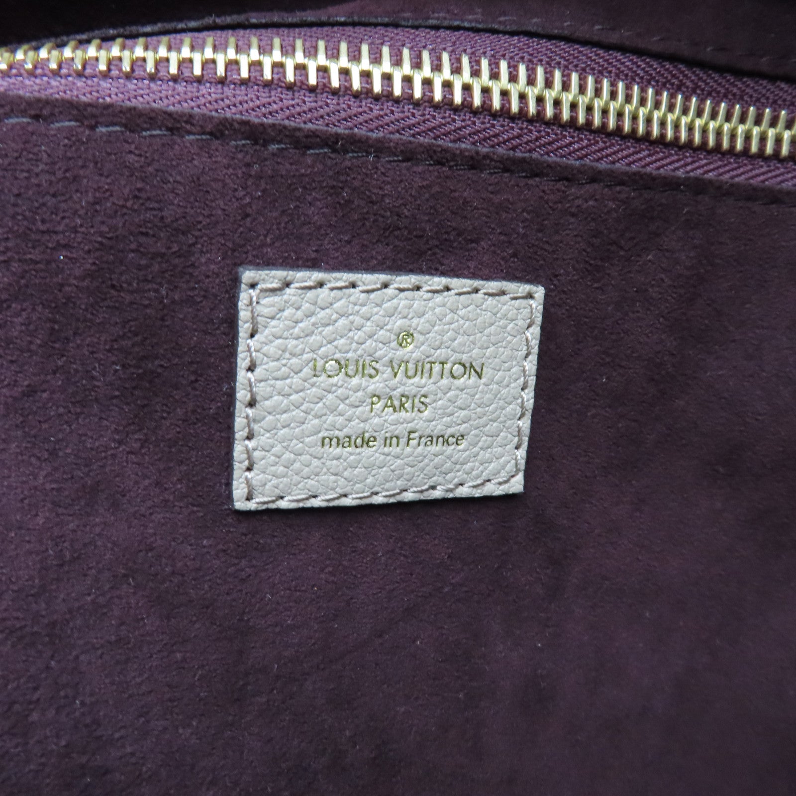 LOUIS VUITTON Monogram Empreinte Neverfull MM gold buckle handle bag light brown