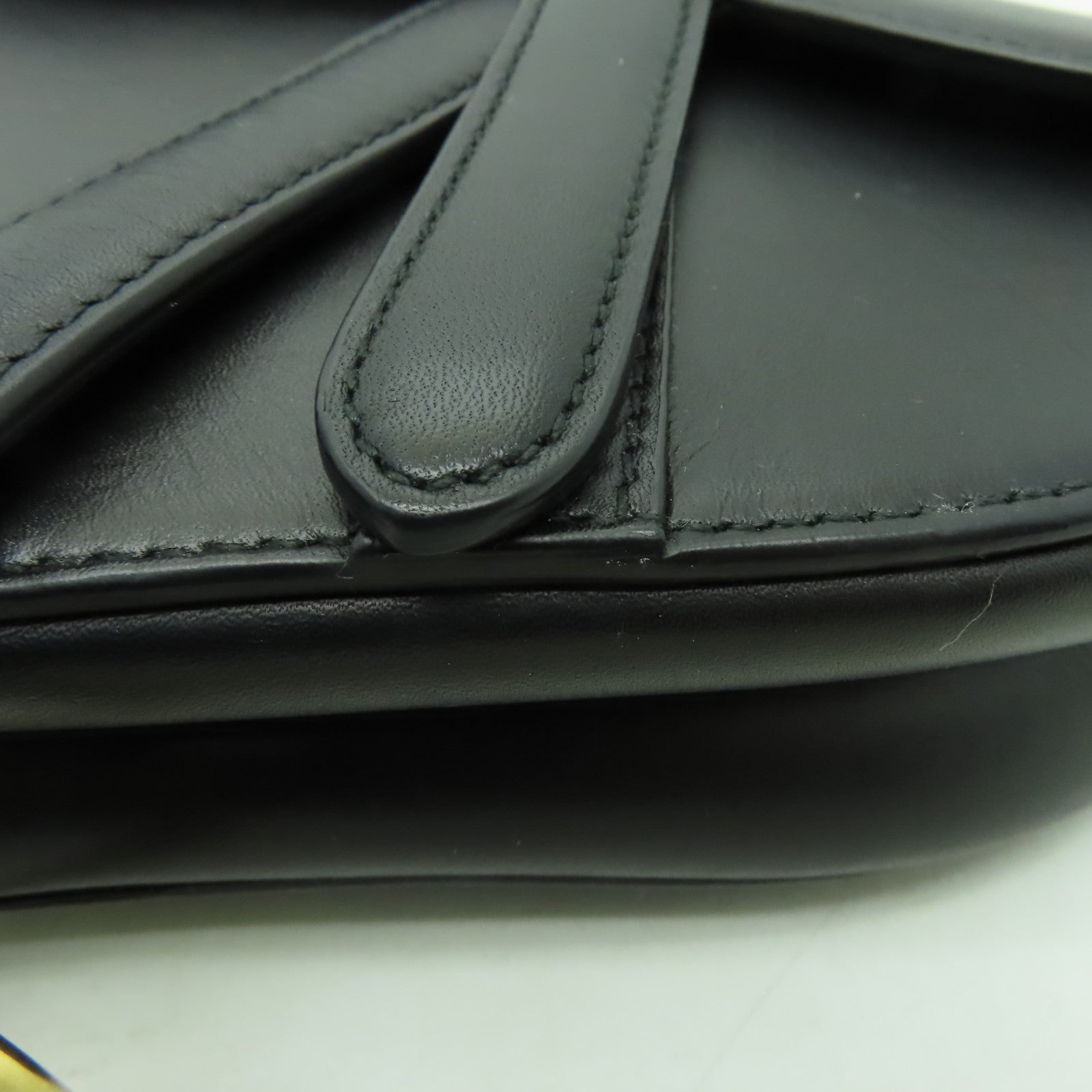 Dior 牛皮皮革Mini Saddle金扣手挽袋黒色