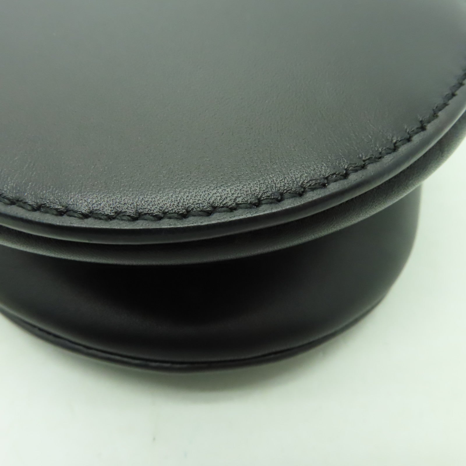 Dior 牛皮皮革Mini Saddle金扣手挽袋黒色
