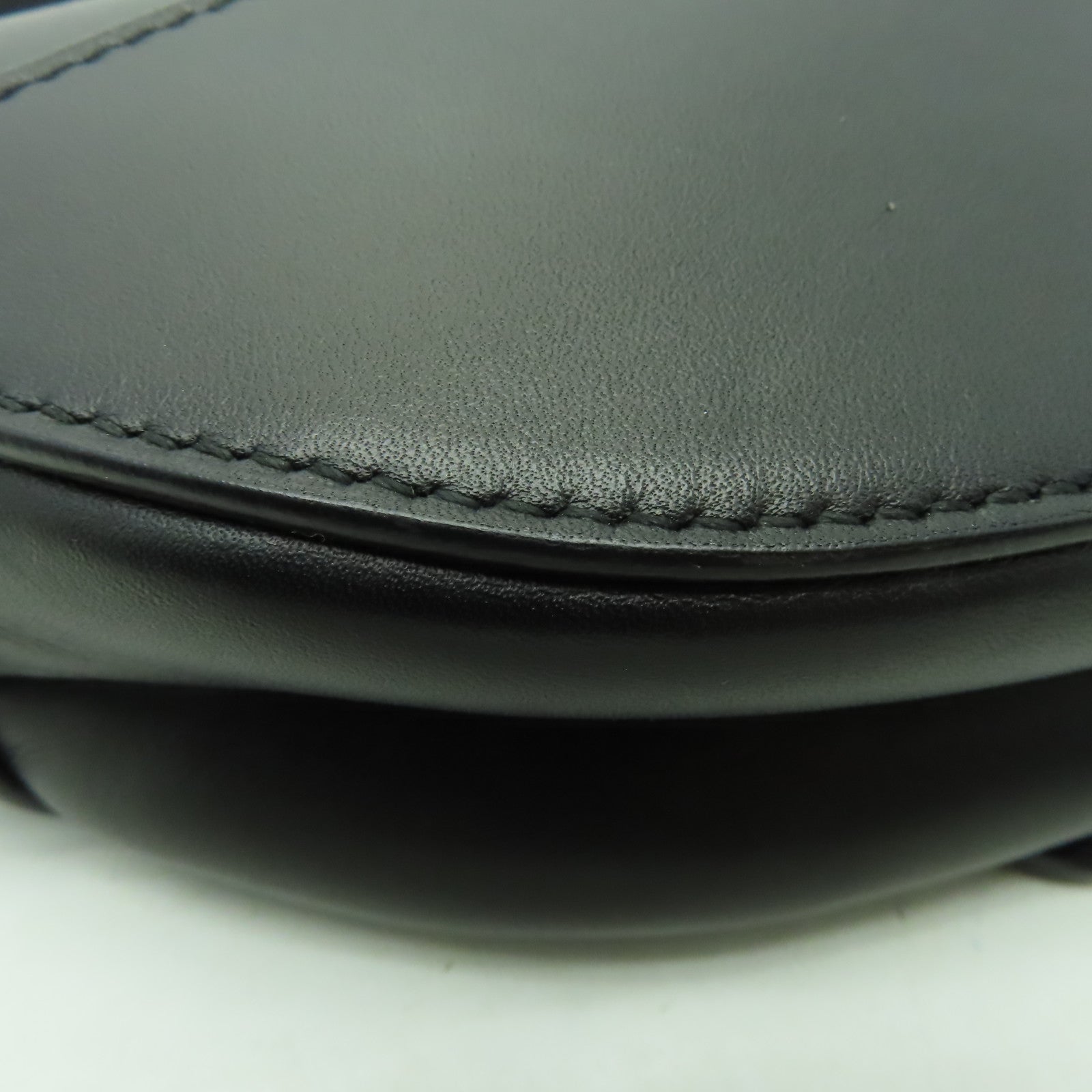 Dior 牛皮皮革Mini Saddle金扣手挽袋黒色