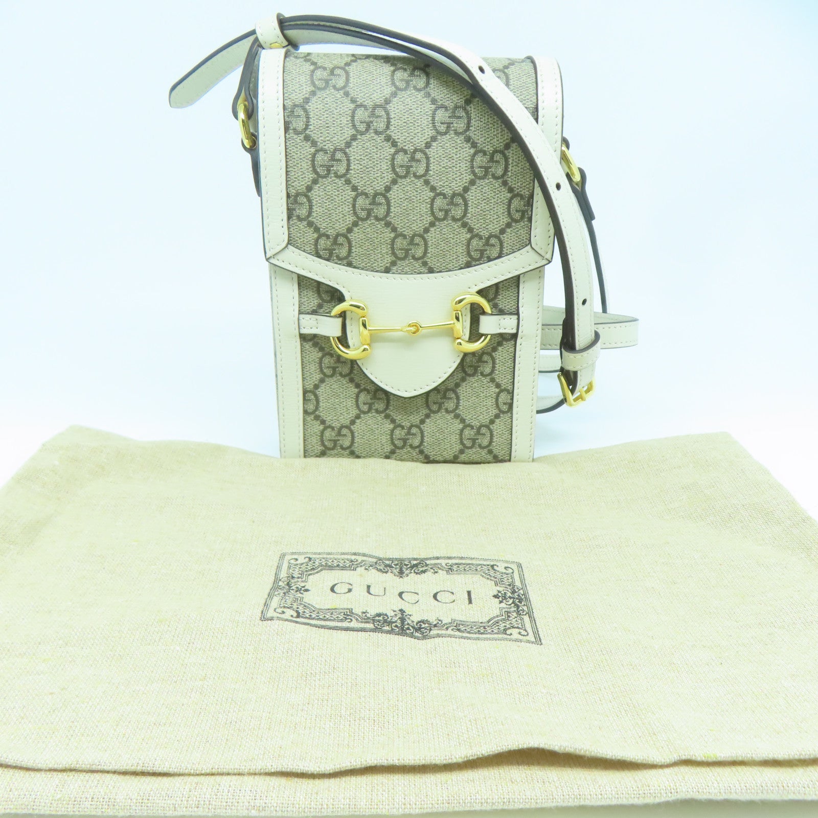 GUCCI 塗層帆布Gucci Horsebit 1955金扣肩背袋白色/啡色