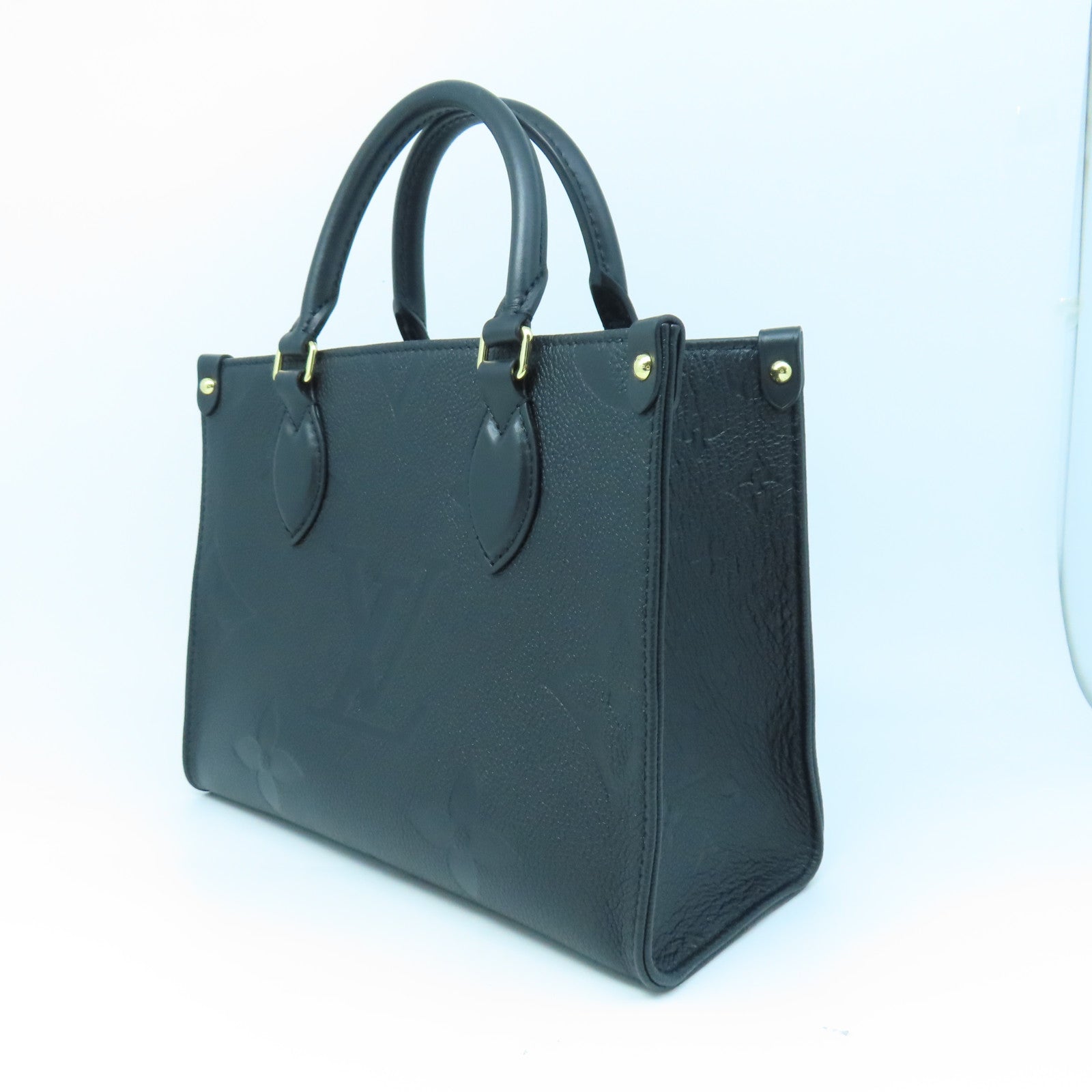 LOUIS VUITTON Monogram Empreinte On The Go PM gold buckle handle shoulder bag dual-use black