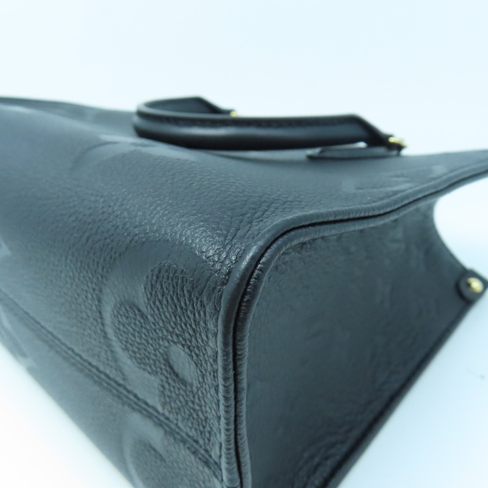 LOUIS VUITTON Monogram Empreinte On The Go PM gold buckle handle shoulder bag dual-use black