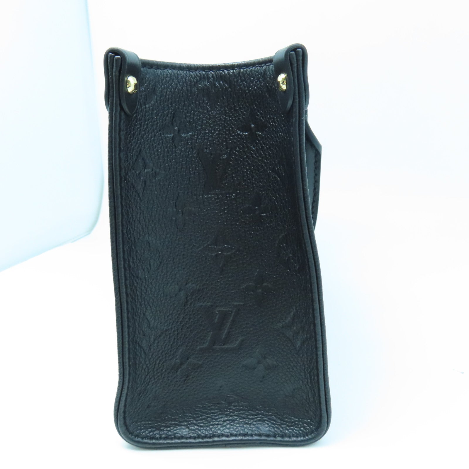 LOUIS VUITTON Monogram Empreinte On The Go PM gold buckle handle shoulder bag dual-use black