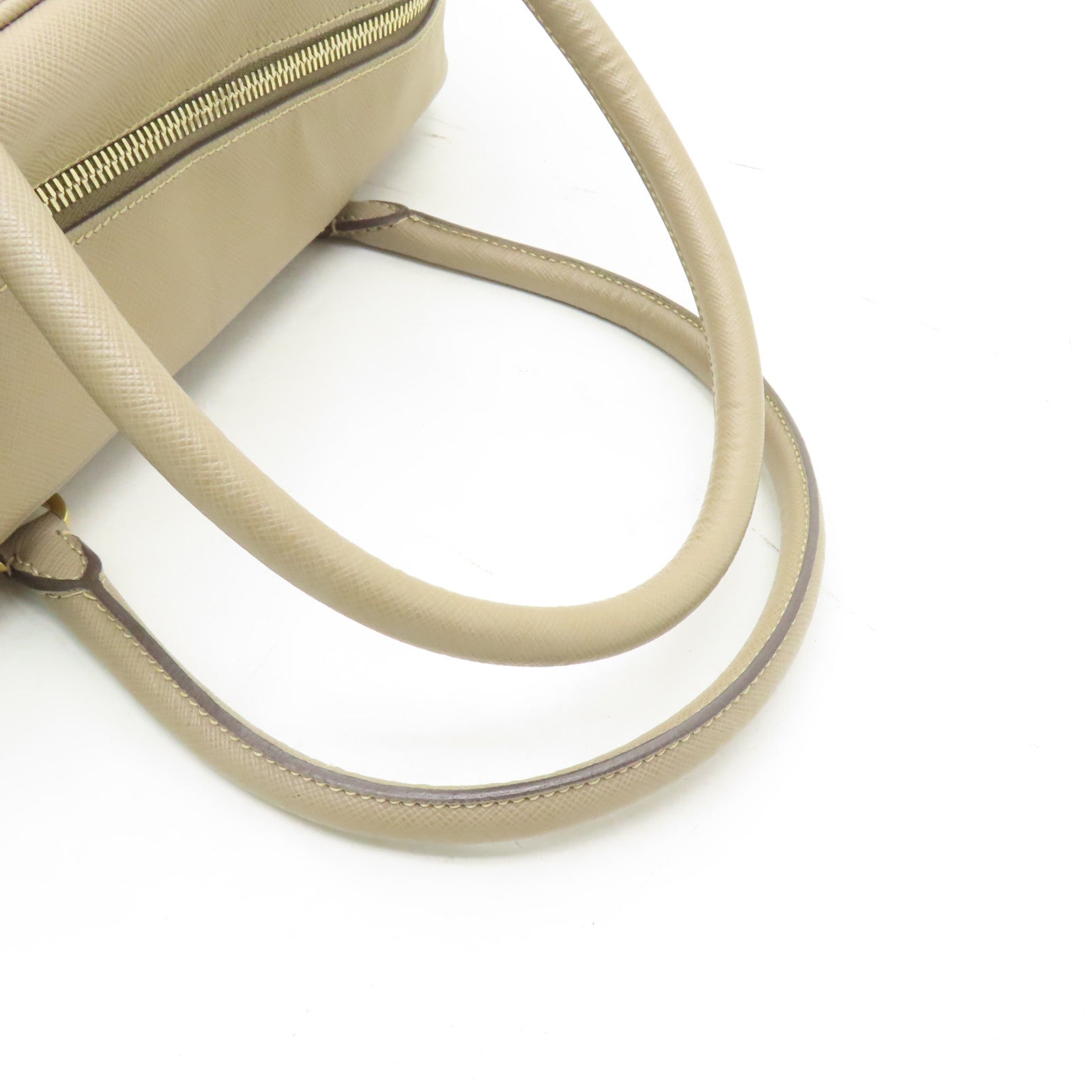 PRADA 牛皮皮革Handbag金扣手挽袋米色