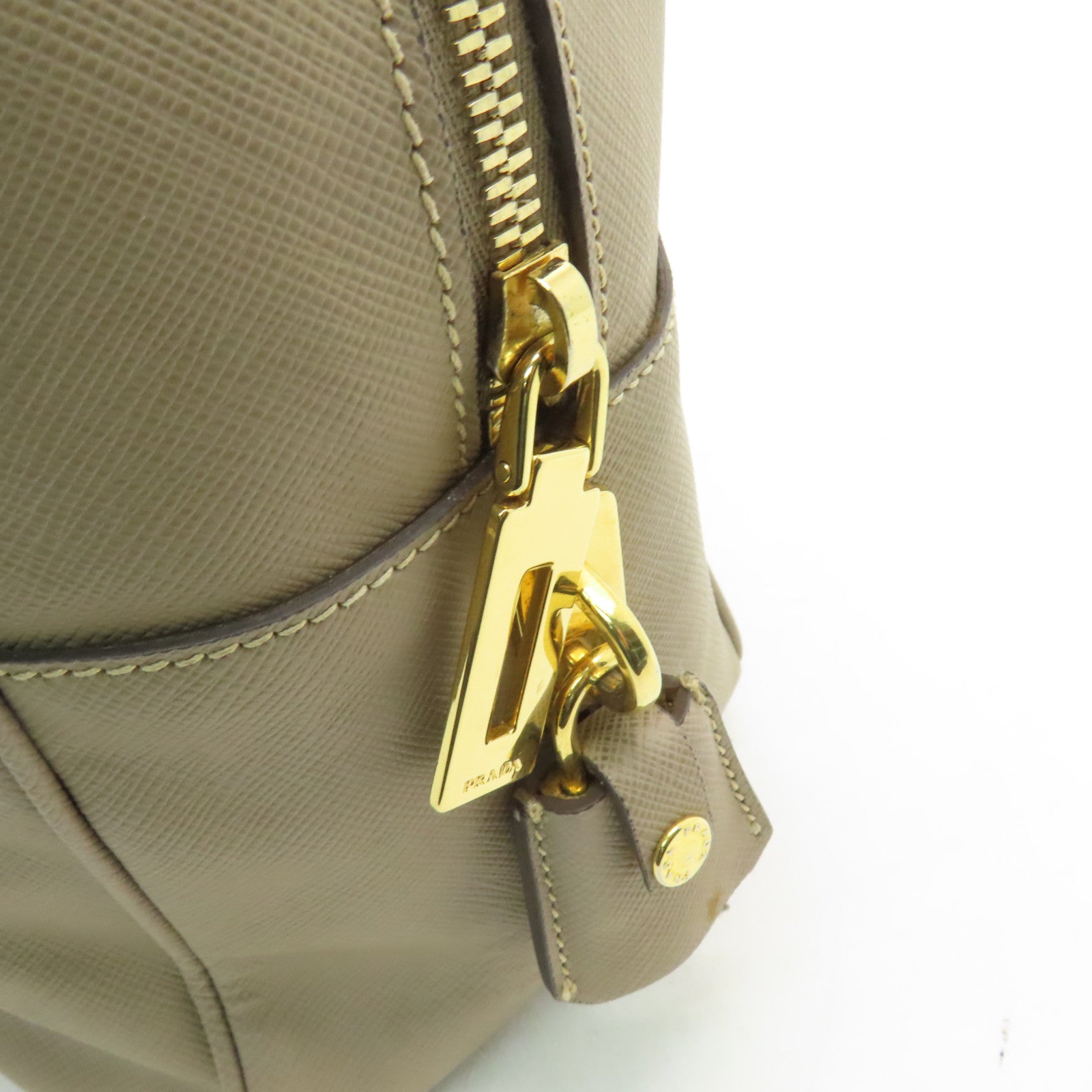 PRADA 牛皮皮革Handbag金扣手挽袋米色