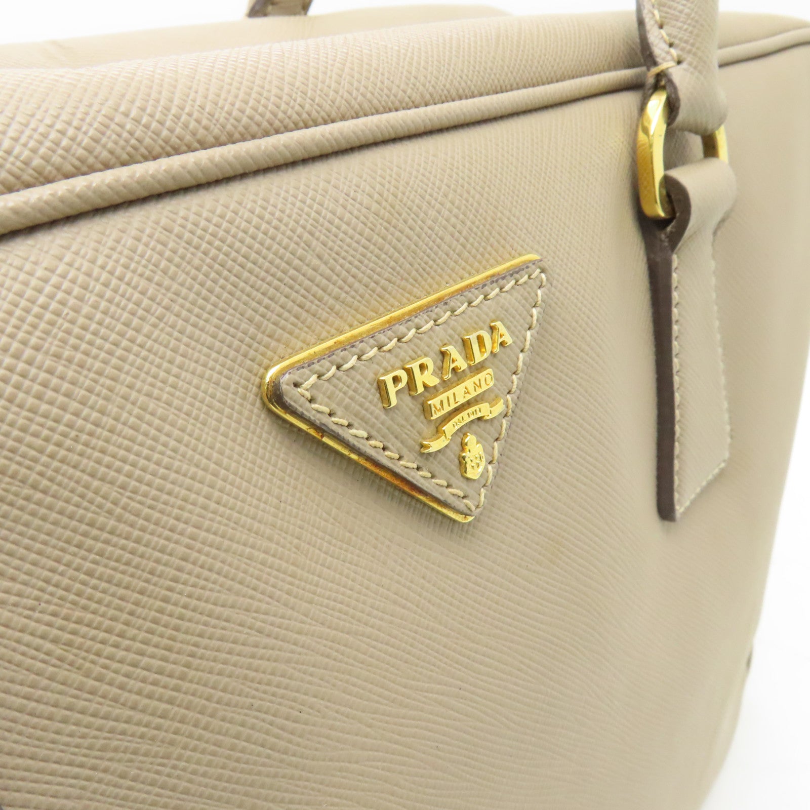 PRADA 牛皮皮革Handbag金扣手挽袋米色