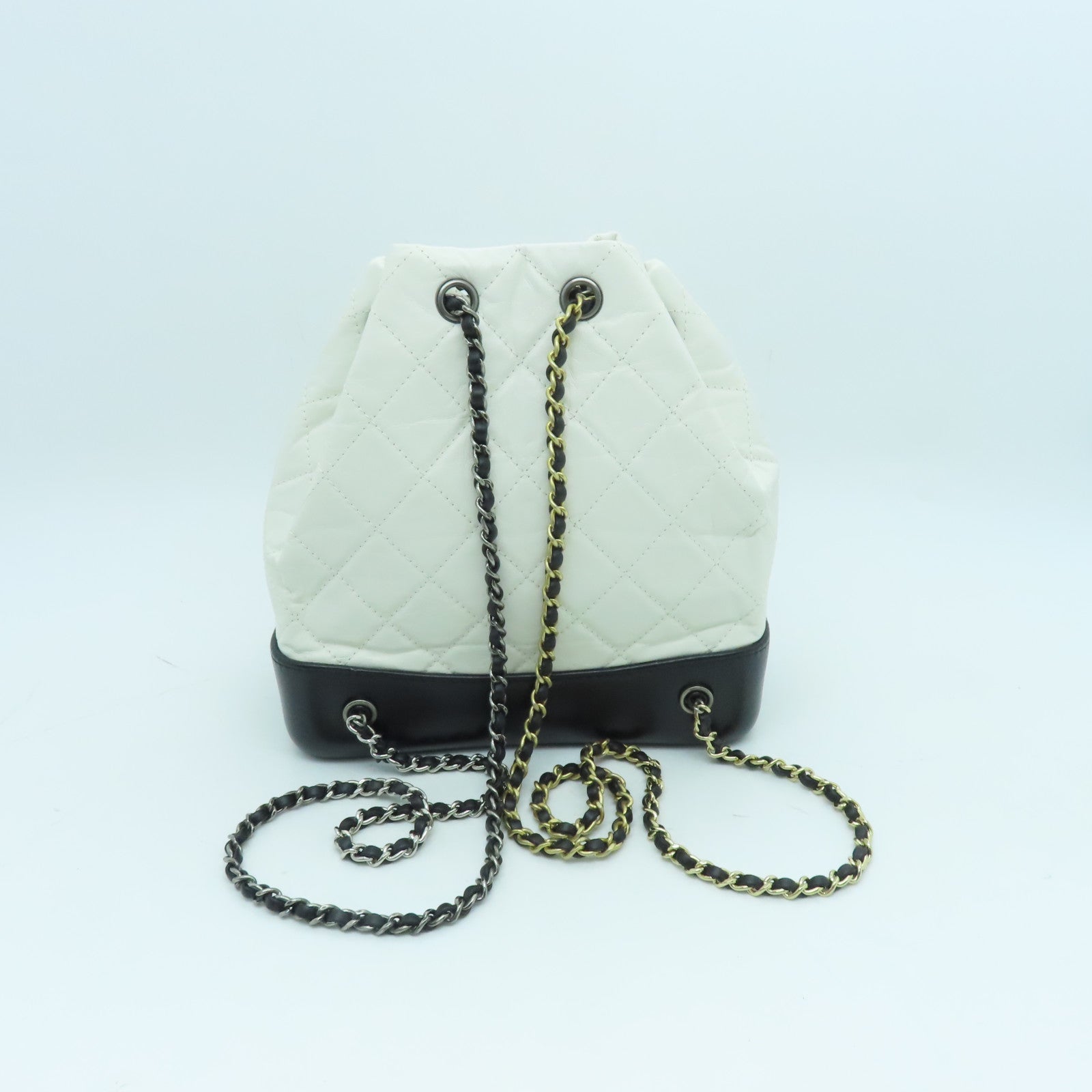 CHANEL cowhide leather Gabrielle Backpack gold and silver buckle backpack white / black