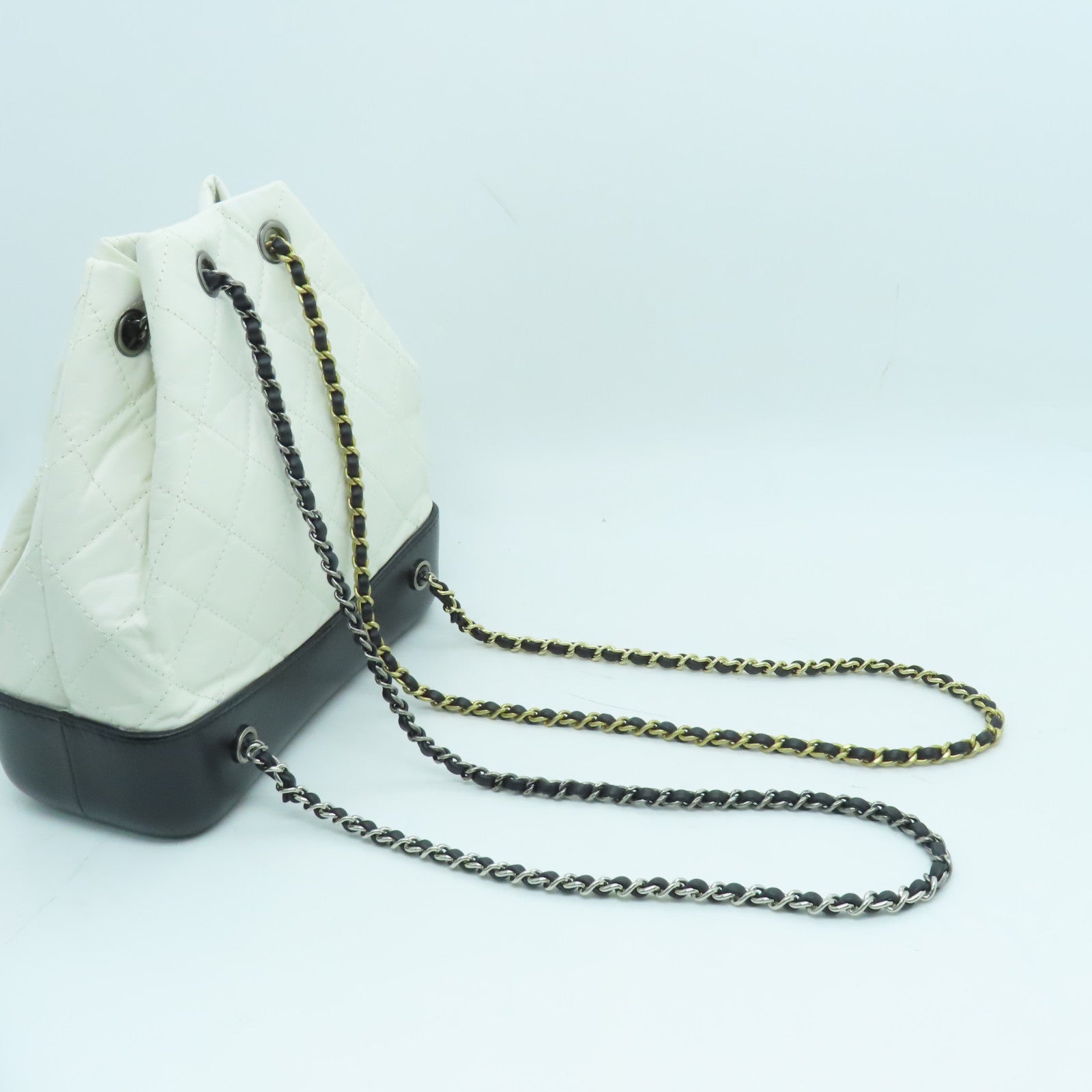 CHANEL cowhide leather Gabrielle Backpack gold and silver buckle backpack white / black