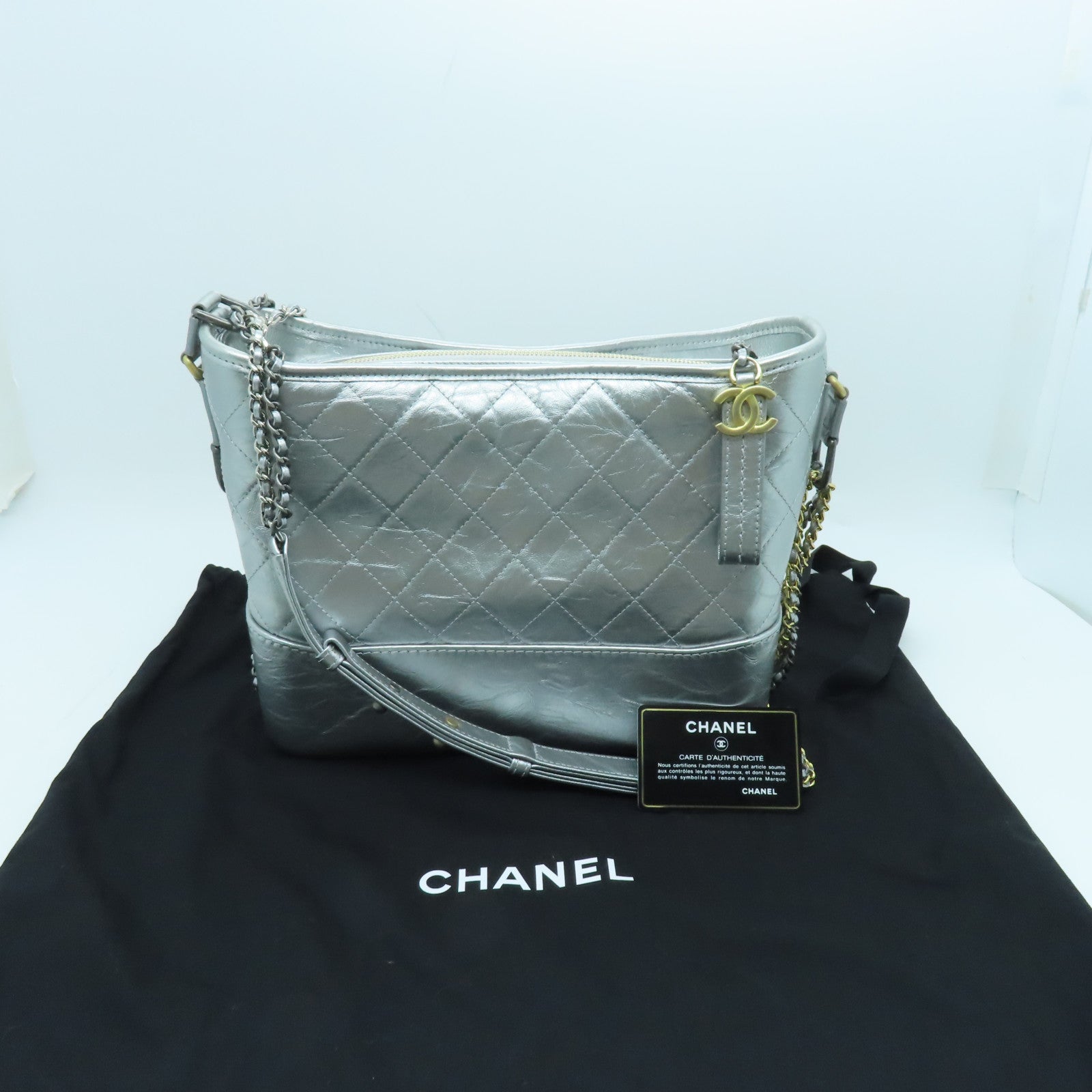 CHANEL cowhide leather Gabrielle gold and silver buckle shoulder bag silver