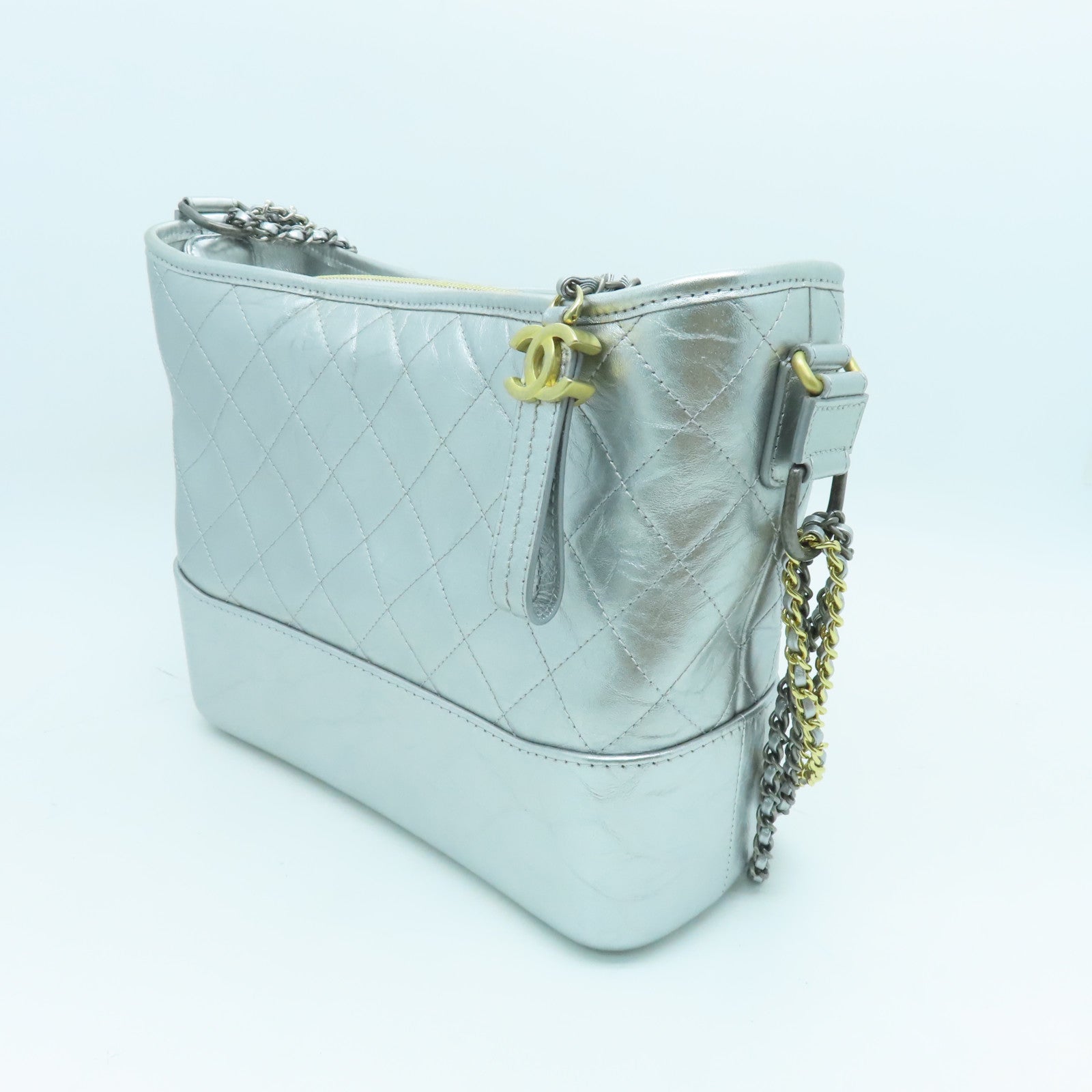 CHANEL cowhide leather Gabrielle gold and silver buckle shoulder bag silver