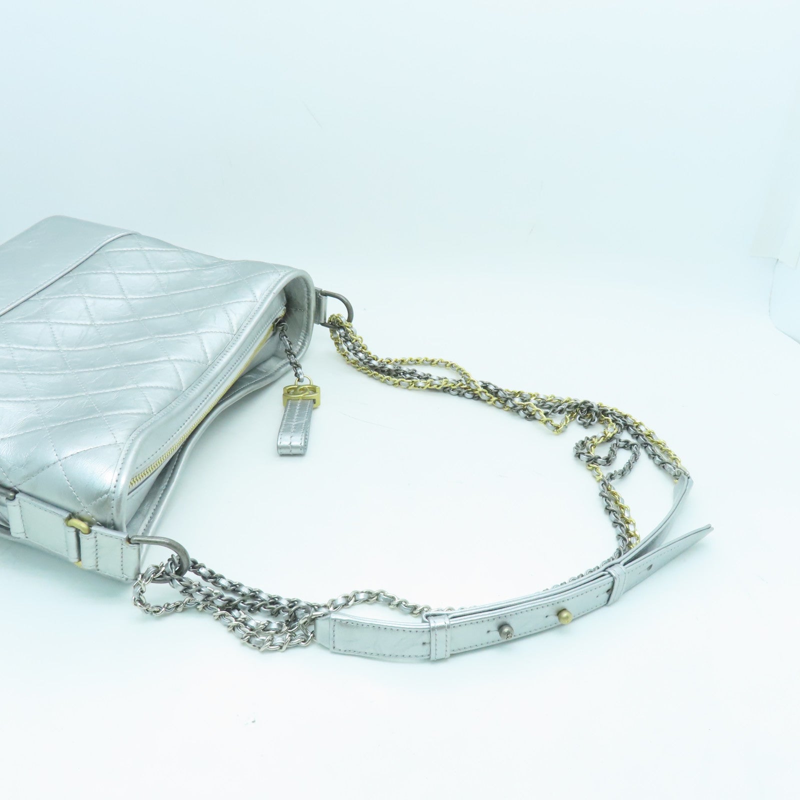 CHANEL cowhide leather Gabrielle gold and silver buckle shoulder bag silver